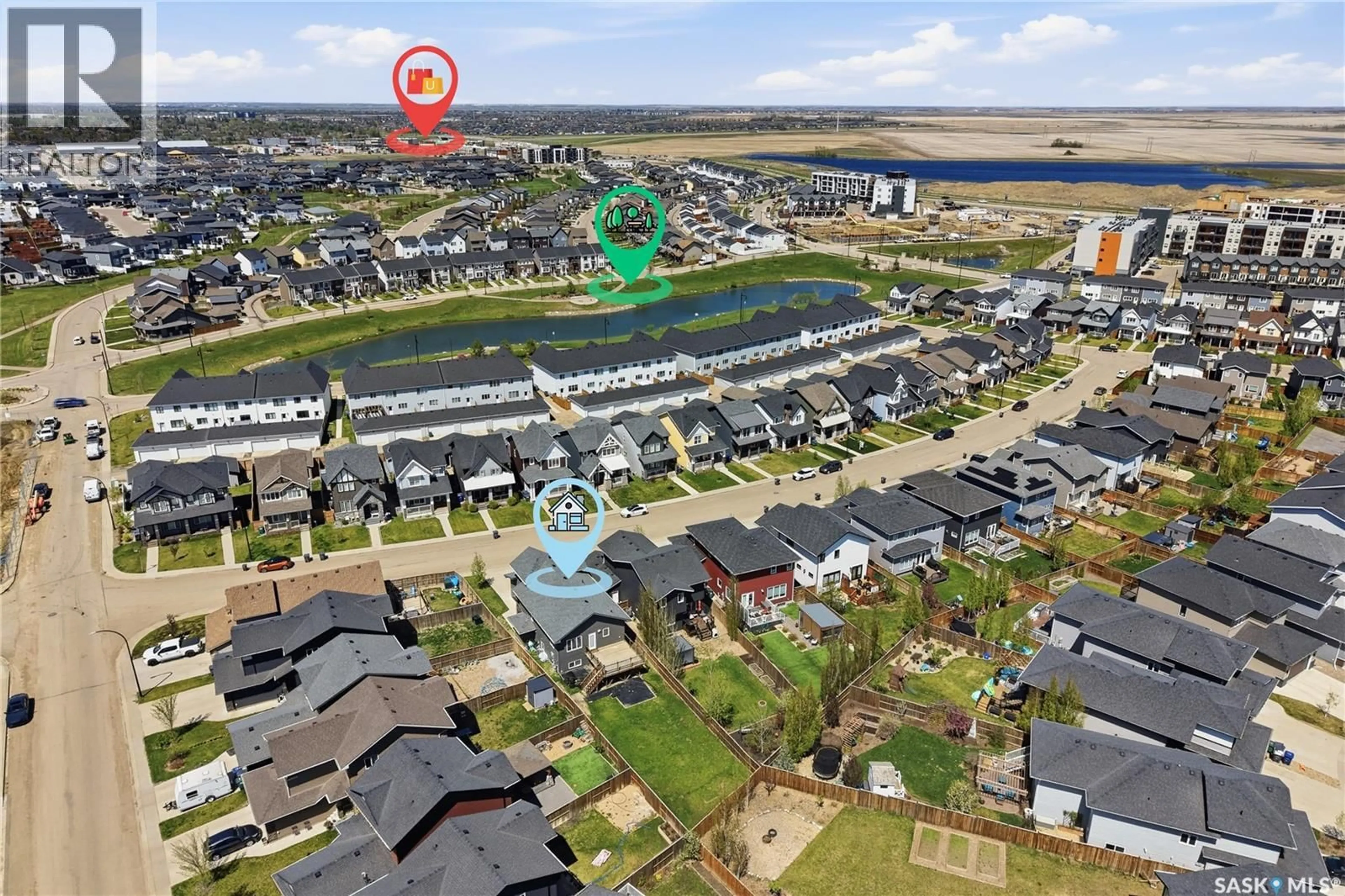 A pic from outside/outdoor area/front of a property/back of a property/a pic from drone, water/lake/river/ocean view for 270 NEWTON LINK, Saskatoon Saskatchewan S7V0M8