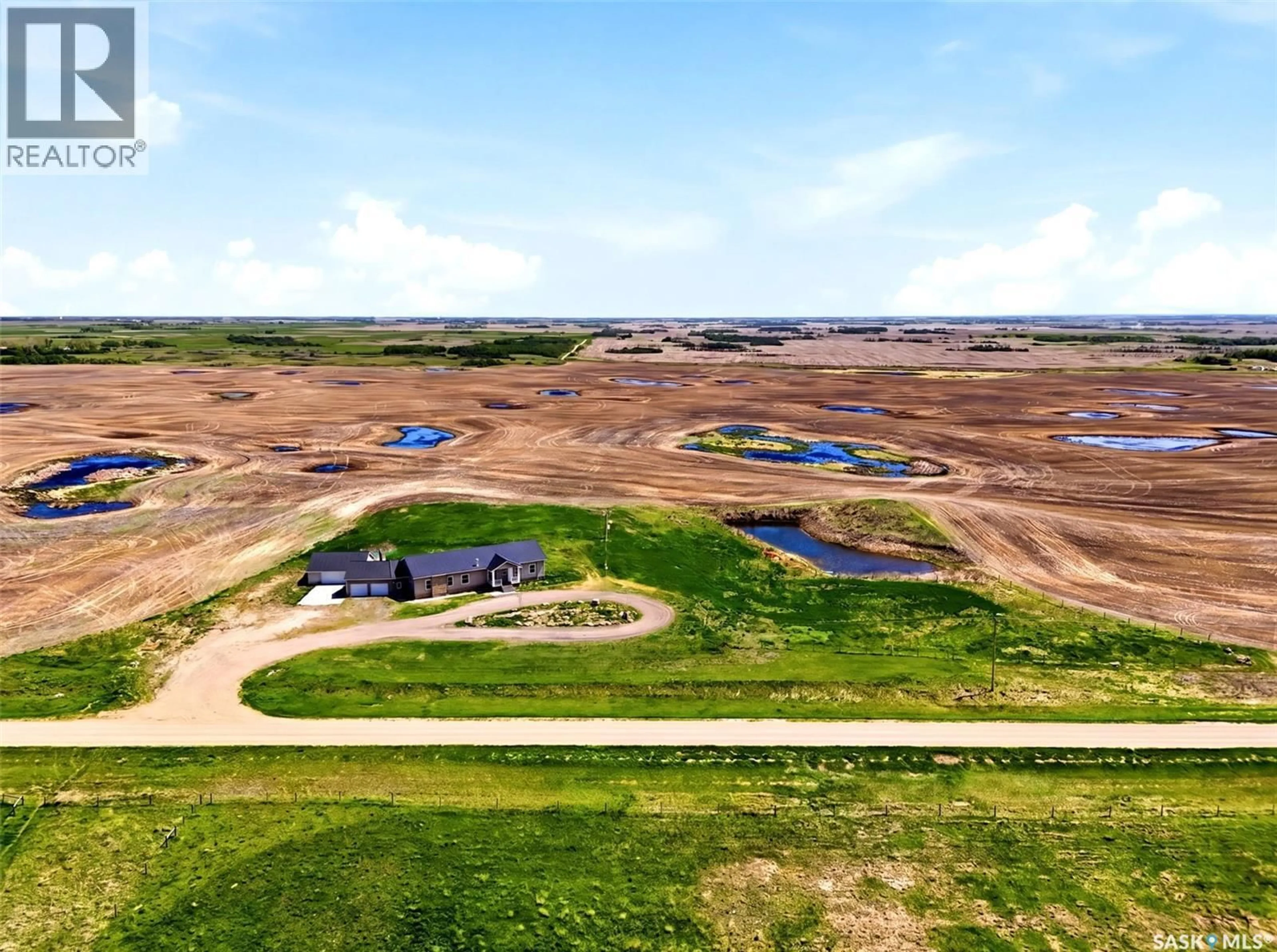 A pic from outside/outdoor area/front of a property/back of a property/a pic from drone, water/lake/river/ocean view for SILTON ACREAGE, Longlaketon Rm No. 219 Saskatchewan S0G4L0
