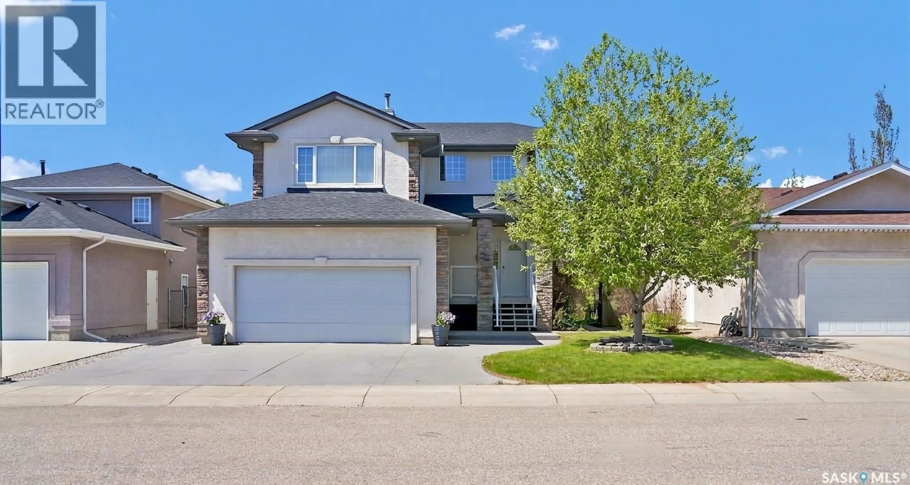 Home with vinyl exterior material, street for 729 GRABOWSKI CRESCENT, Warman Saskatchewan S0K4S0
