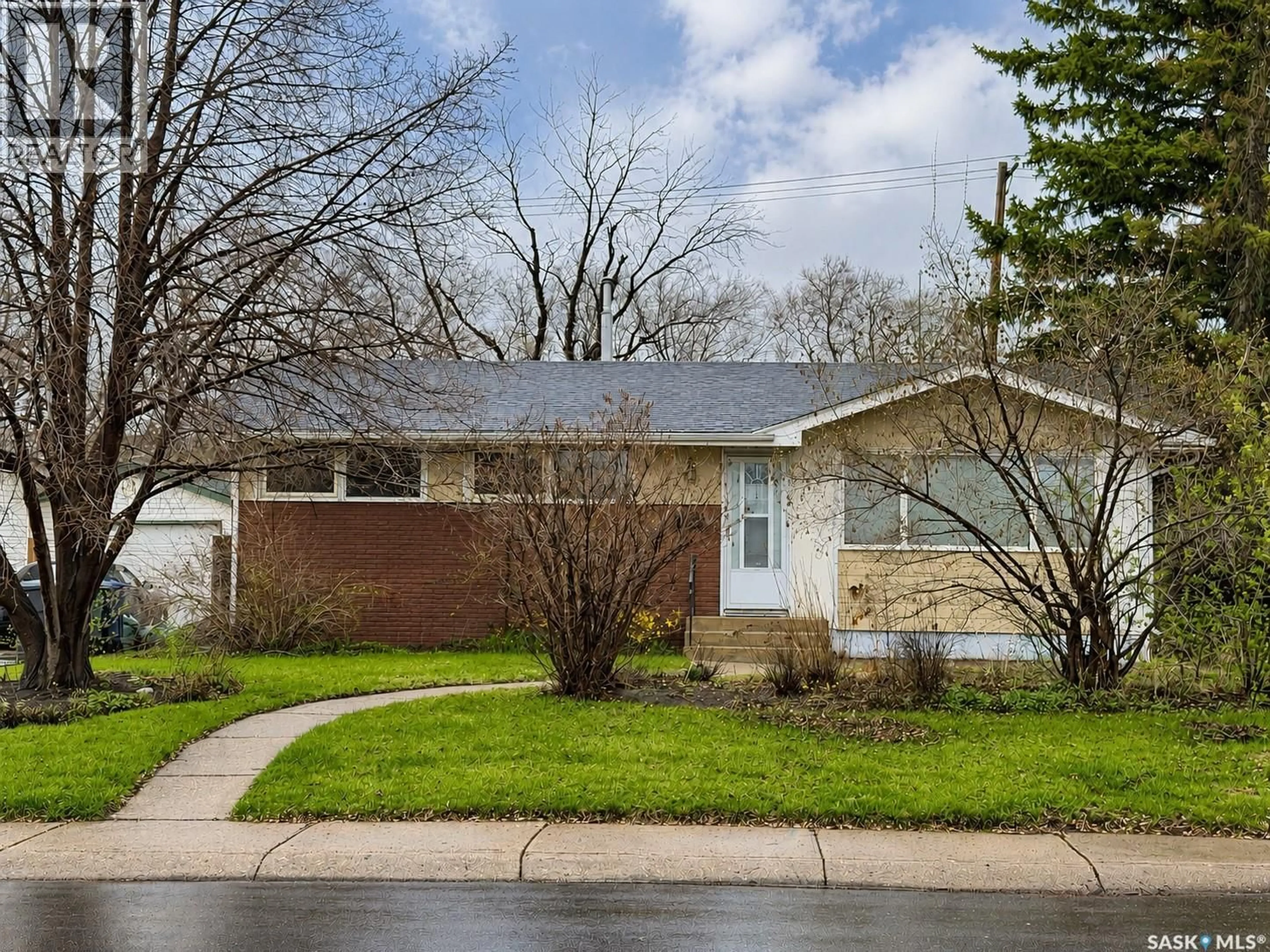 Home with brick exterior material, street for 70 LINDSAY DRIVE, Saskatoon Saskatchewan S7H4B4