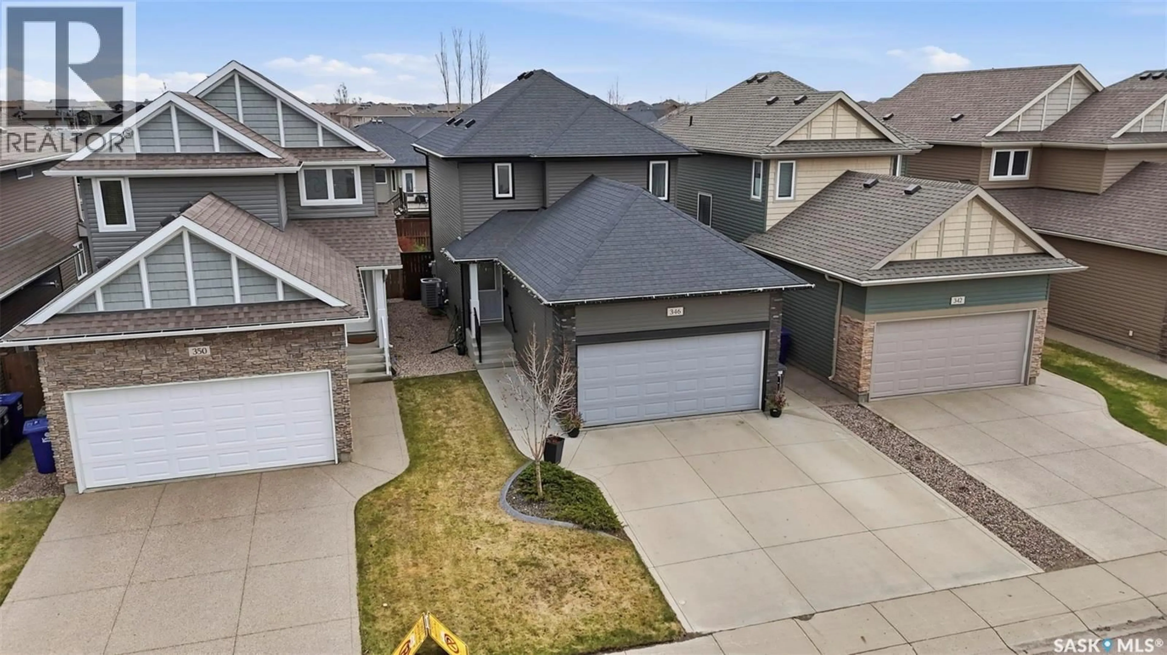 A pic from outside/outdoor area/front of a property/back of a property/a pic from drone, street for 346 DICKSON CRESCENT, Saskatoon Saskatchewan S7T0T8