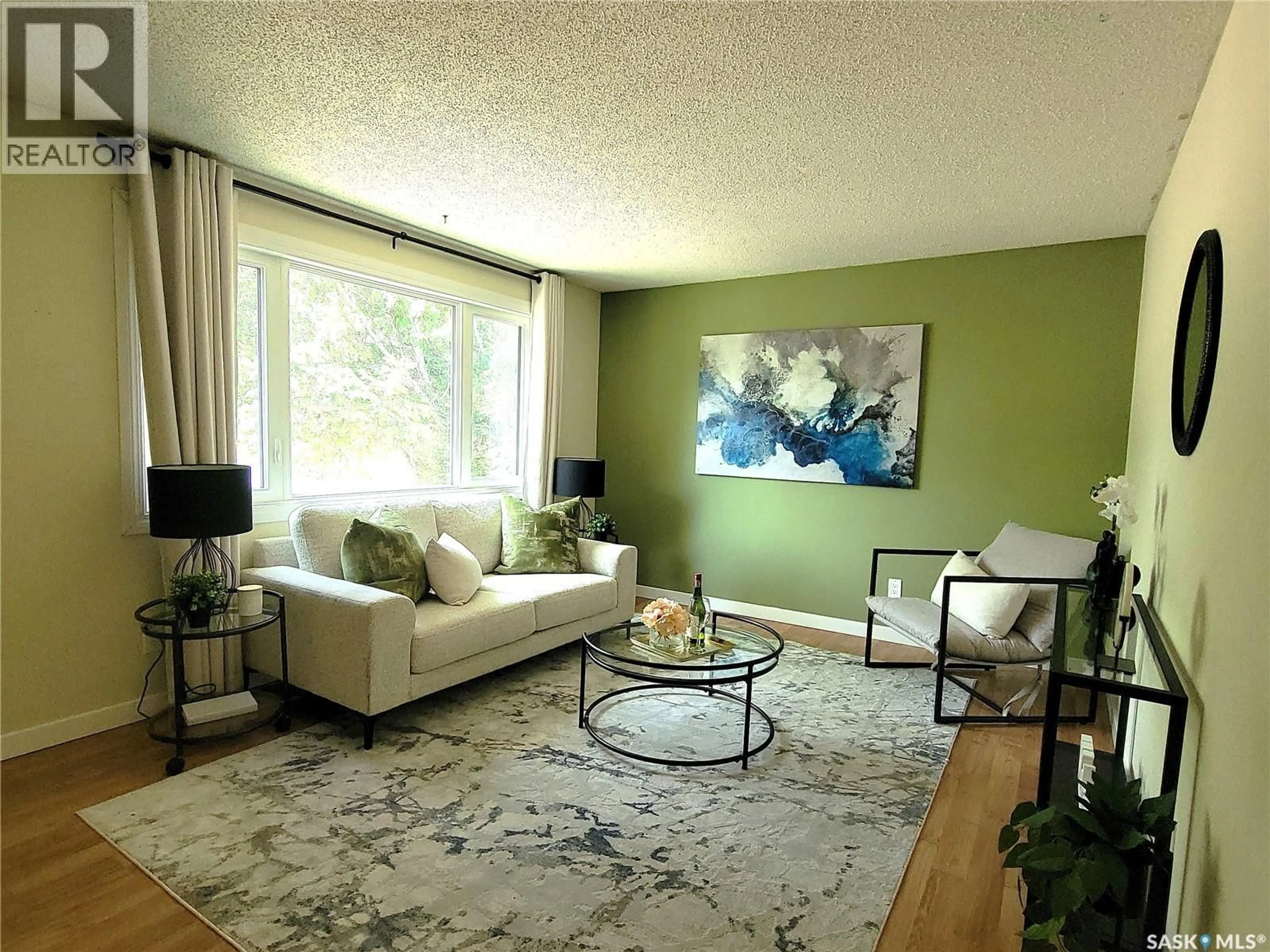 Living room with furniture, carpet floor for 1621 GREIG AVENUE, Saskatoon Saskatchewan S7N2K1