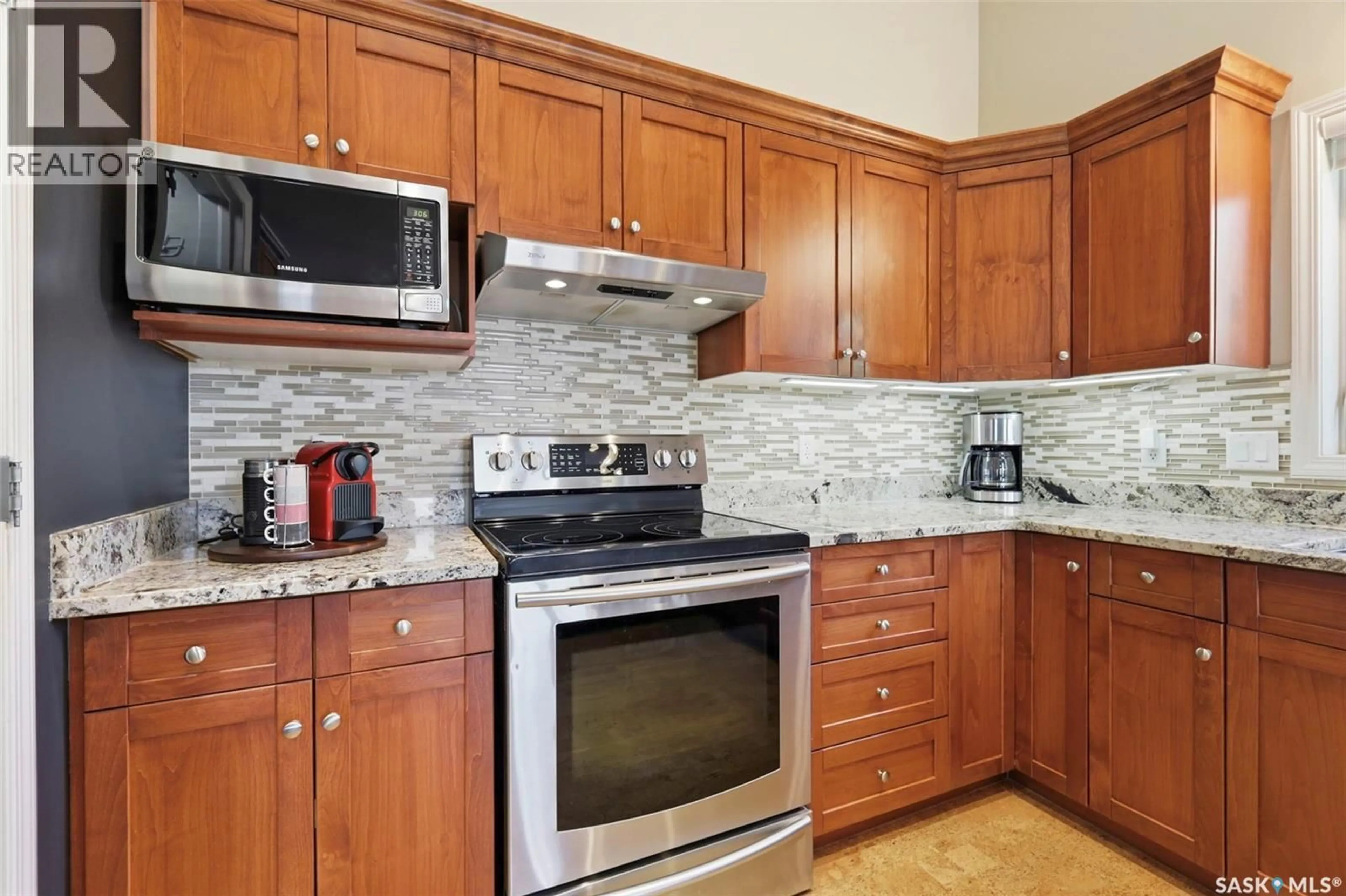 Standard kitchen, ceramic/tile floor for 104 - 1110 BRIARWOOD ROAD, Saskatoon Saskatchewan S7V0A1