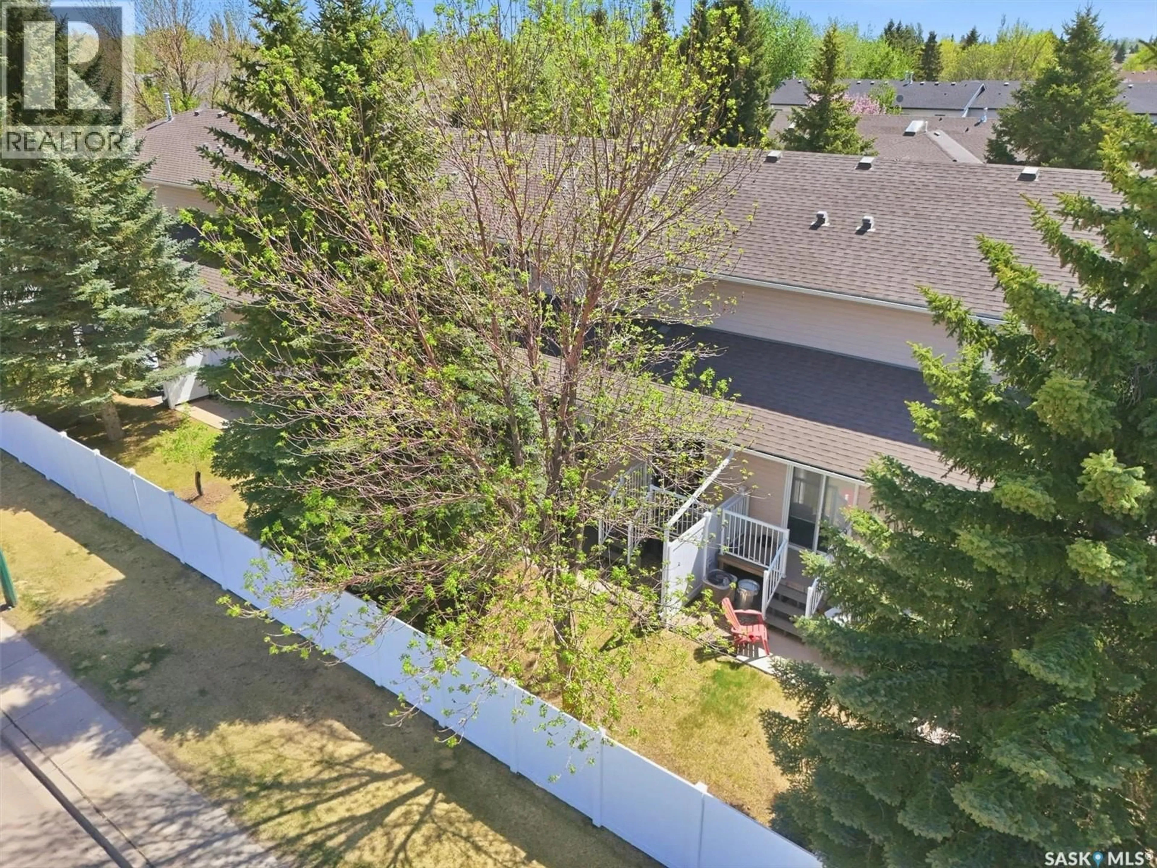 A pic from outside/outdoor area/front of a property/back of a property/a pic from drone, unknown for 105 - 615 MCWILLIE AVENUE, Saskatoon Saskatchewan S7S1J4