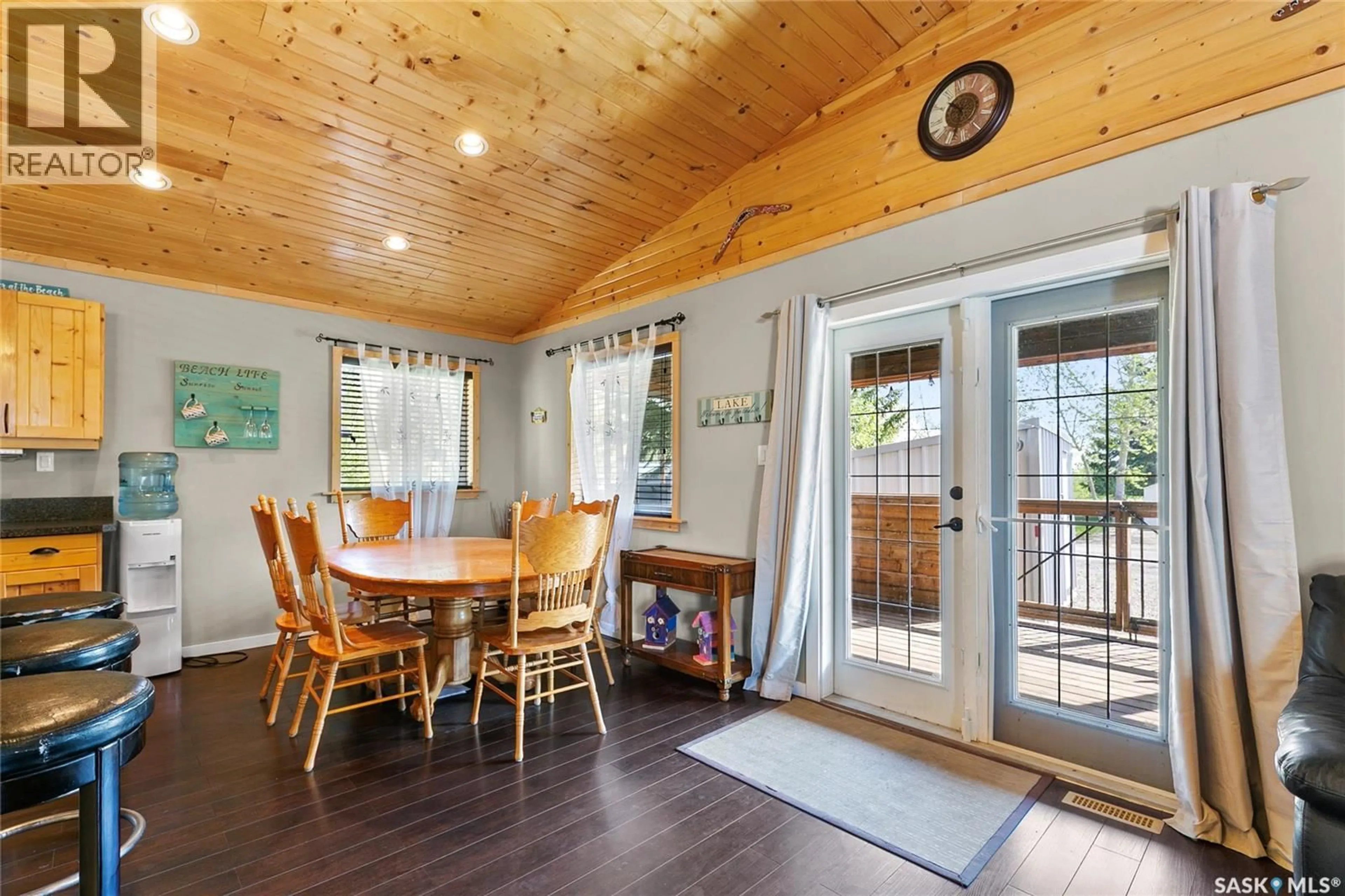 Dining room, wood/laminate floor for 22 ASH STREET, Grandview Beach Saskatchewan S0G1C0