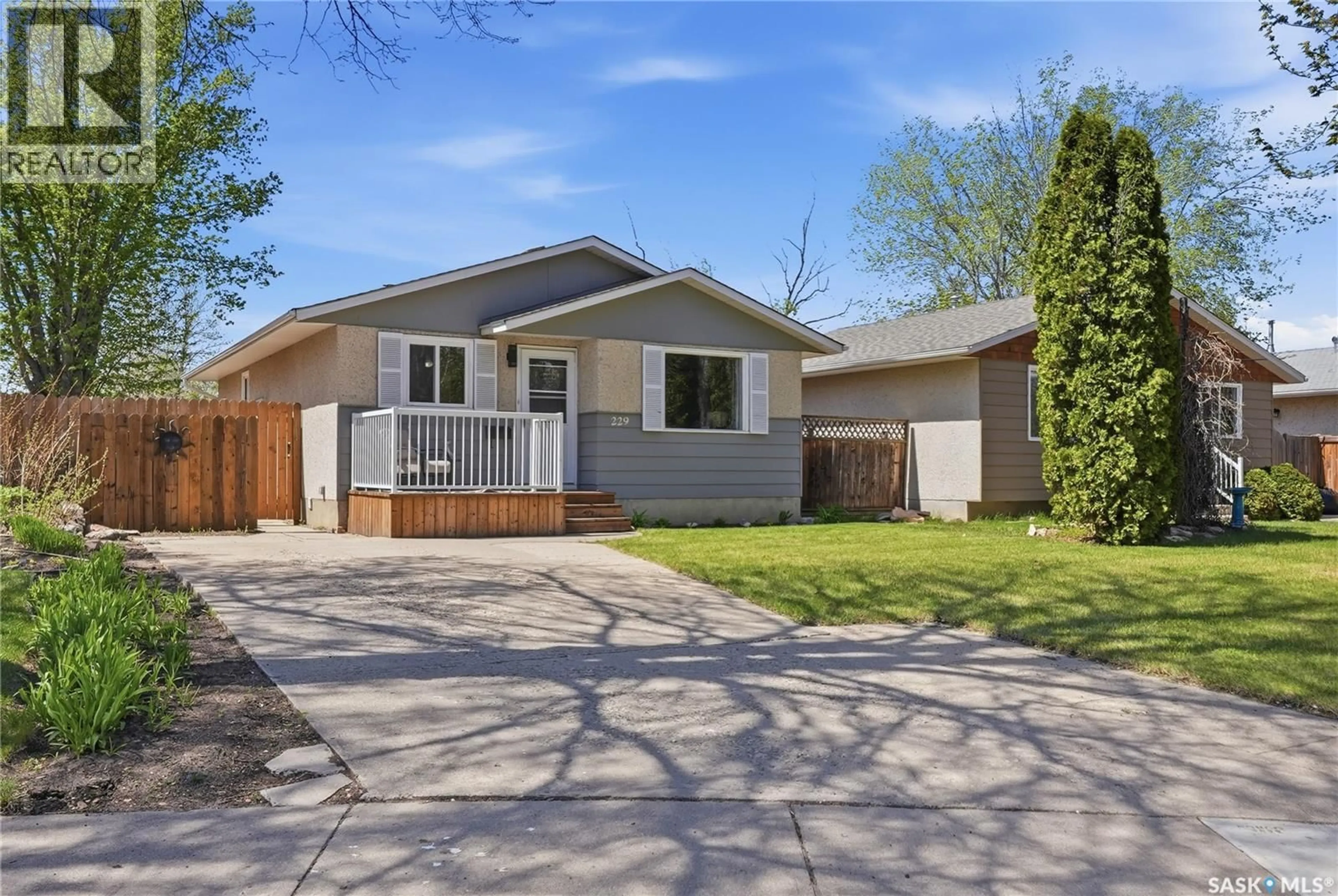 Home with vinyl exterior material, street for 229 ACADIA PLACE, Saskatoon Saskatchewan S7H3W3