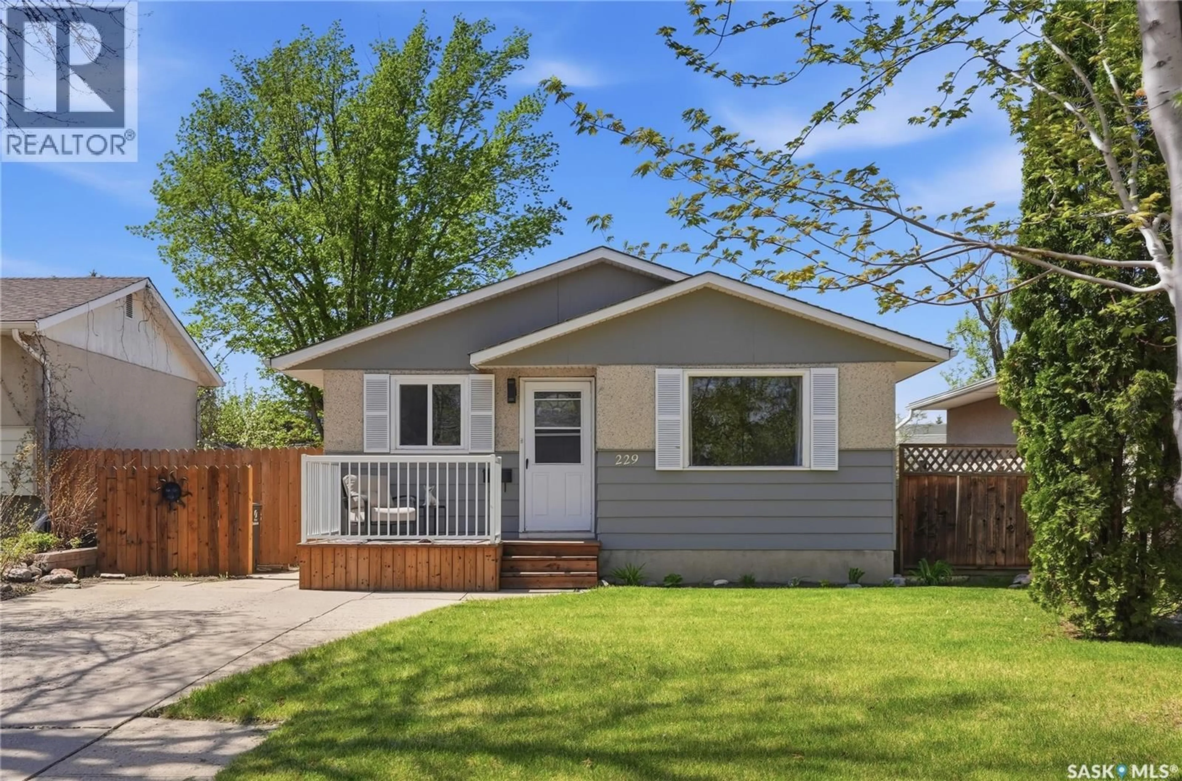 Home with vinyl exterior material, street for 229 ACADIA PLACE, Saskatoon Saskatchewan S7H3W3