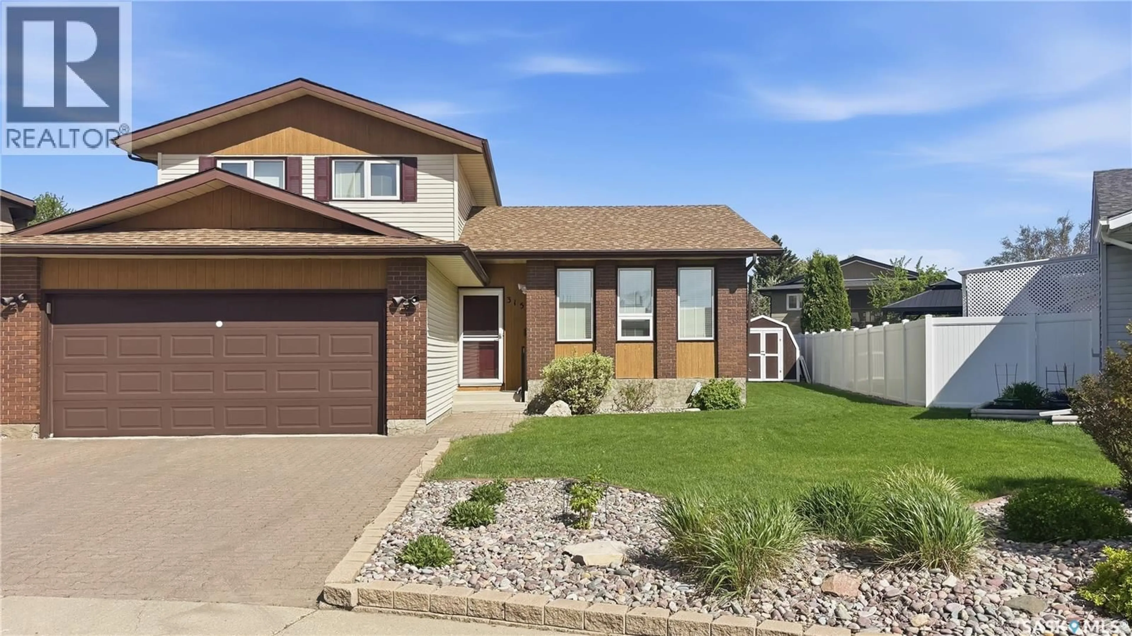 Home with brick exterior material, street for 315 SMITH PLACE, Saskatoon Saskatchewan S7M5E7