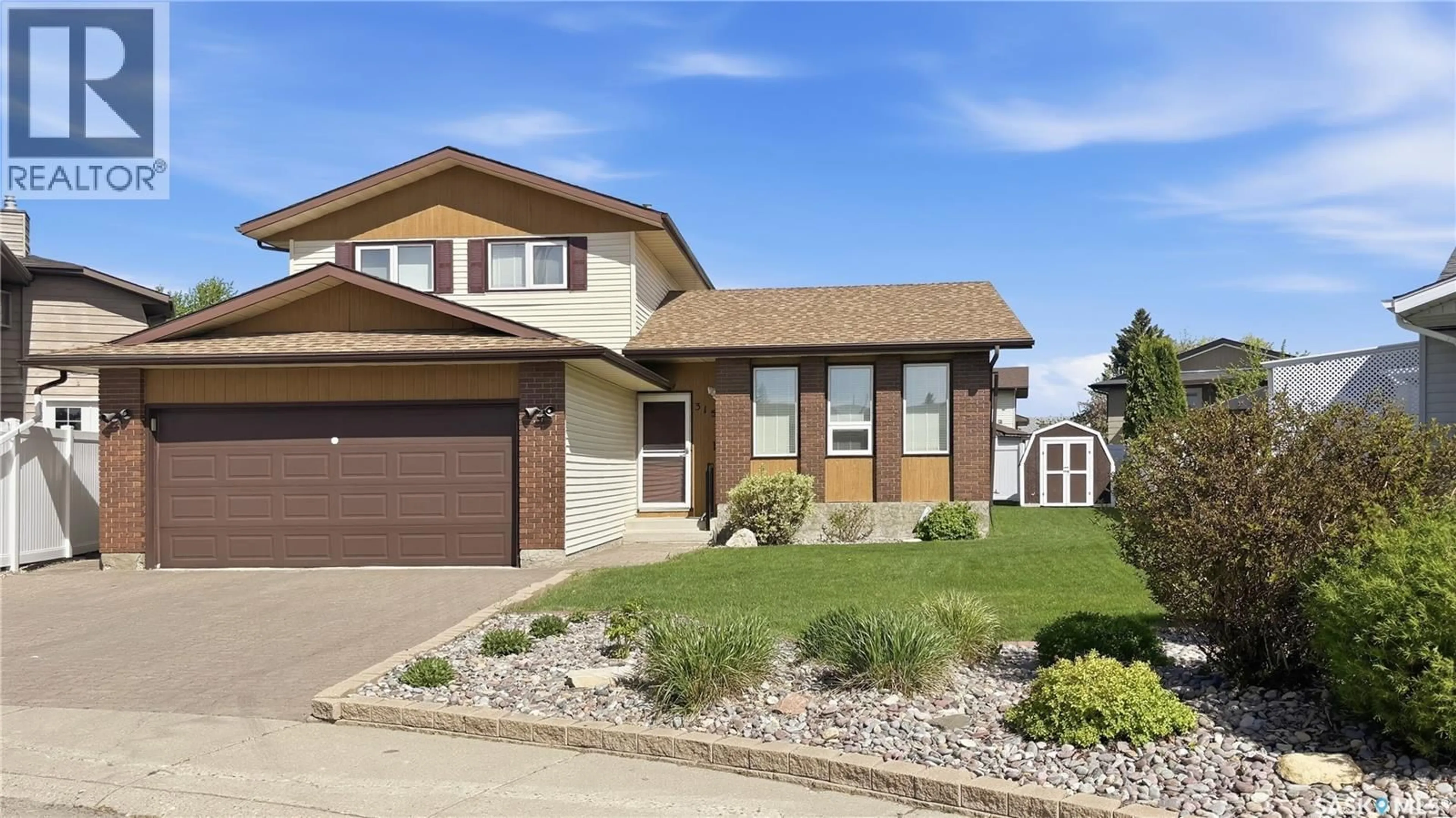 Home with brick exterior material, street for 315 SMITH PLACE, Saskatoon Saskatchewan S7M5E7