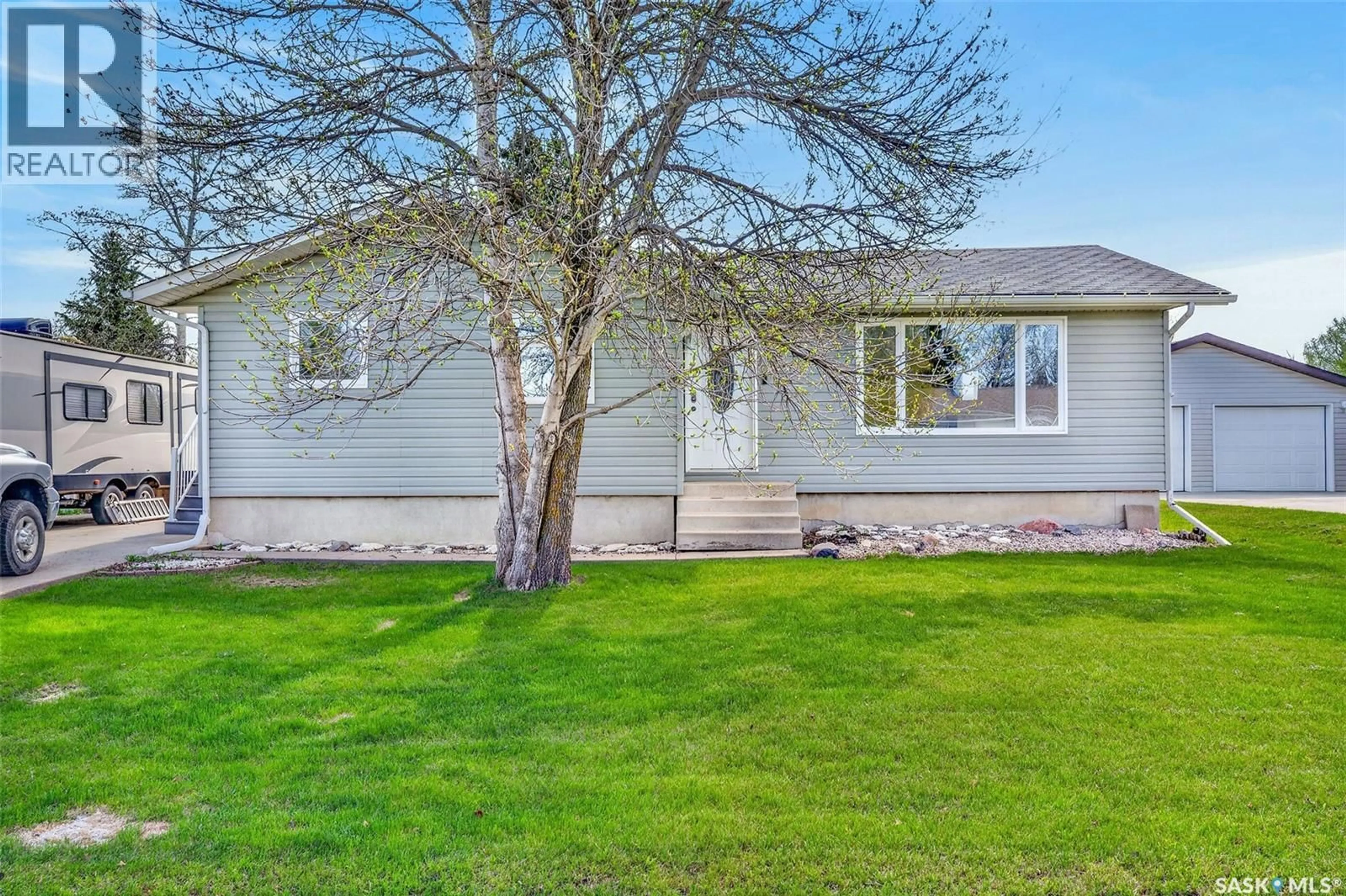 Home with vinyl exterior material, street for 314 CASKEY DRIVE, Melfort Saskatchewan S0E1A0