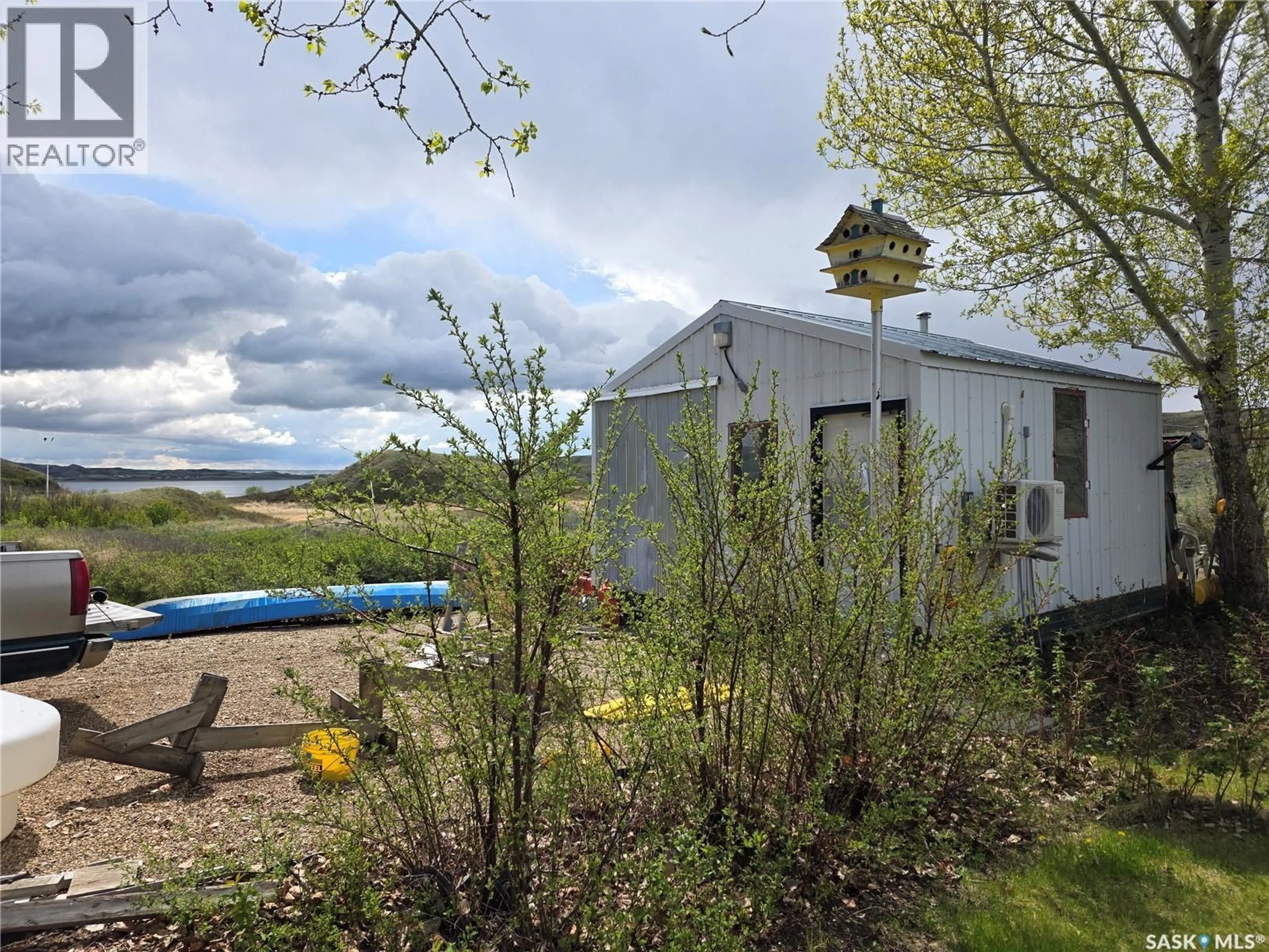 A pic from outside/outdoor area/front of a property/back of a property/a pic from drone, water/lake/river/ocean view for 76 WALLEYE WAY, Victory Rm No. 226 Saskatchewan S0L0C0