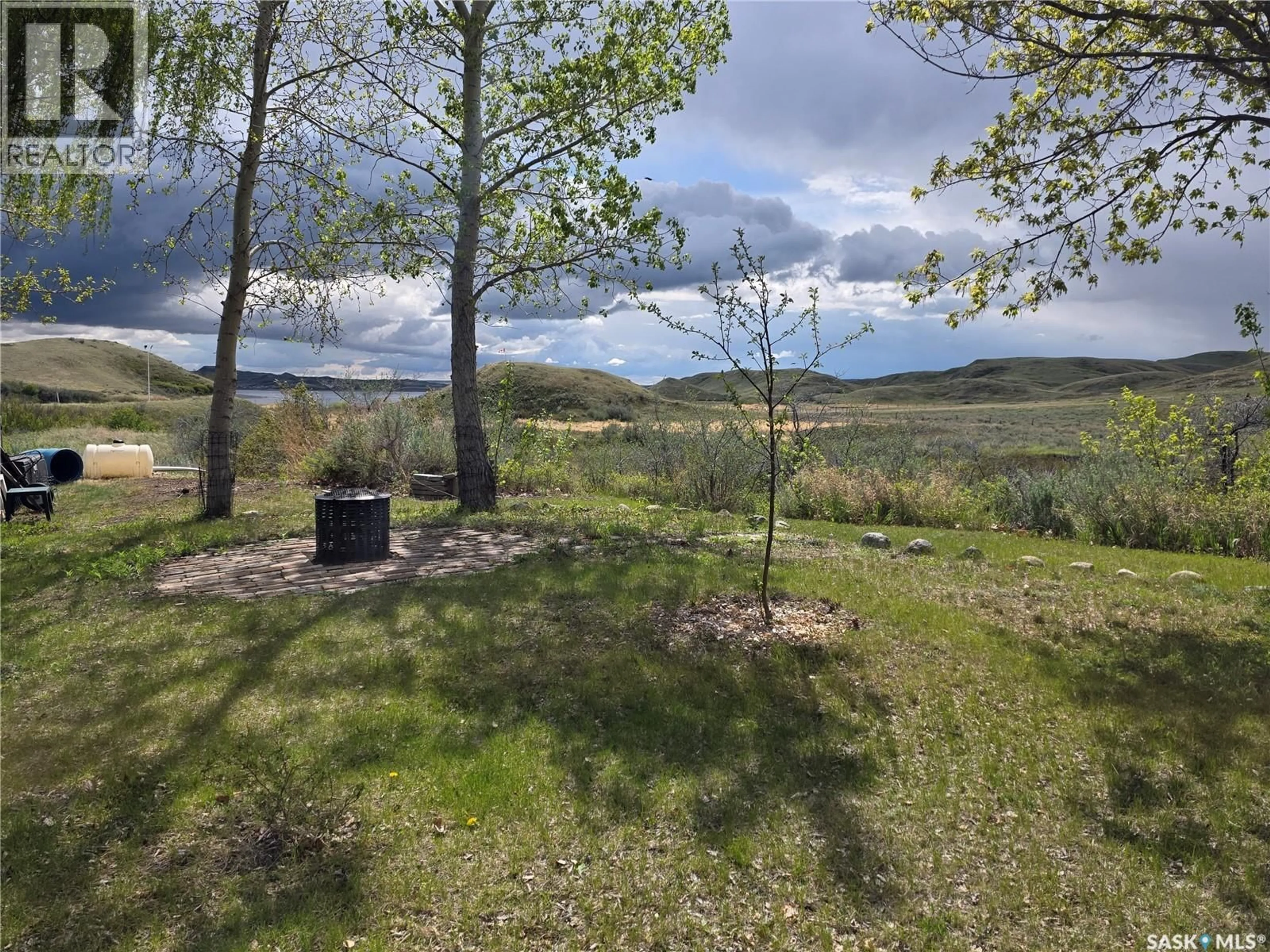 A pic from outside/outdoor area/front of a property/back of a property/a pic from drone, forest/trees view for 76 WALLEYE WAY, Victory Rm No. 226 Saskatchewan S0L0C0