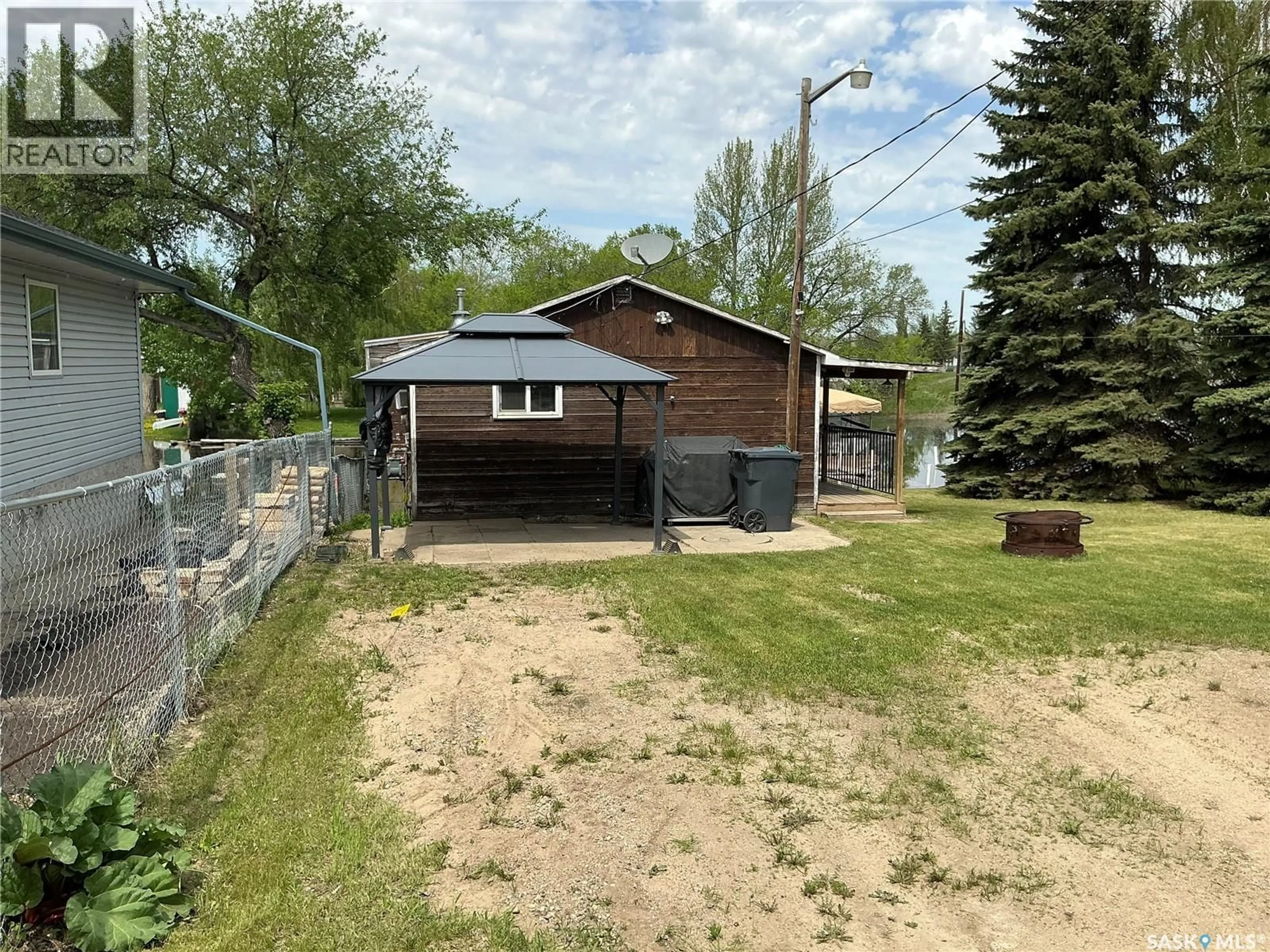 A pic from outside/outdoor area/front of a property/back of a property/a pic from drone, street for 9102 HUNTS COVE CRESCENT, Cochin Saskatchewan S0M0L0