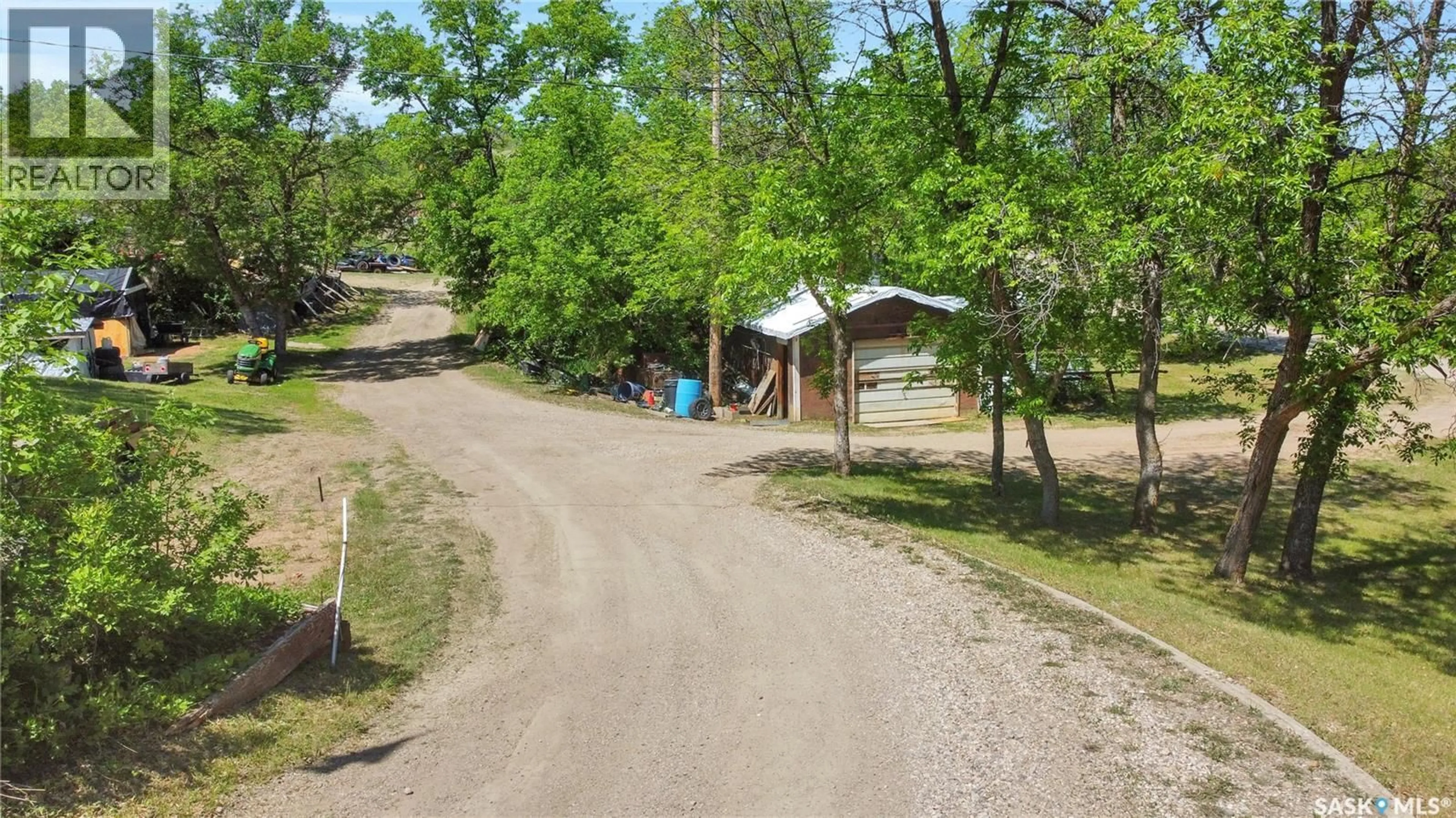 A pic from outside/outdoor area/front of a property/back of a property/a pic from drone, street for 701 TATANKA DRIVE, Buffalo Pound Lake Saskatchewan S6H0H0