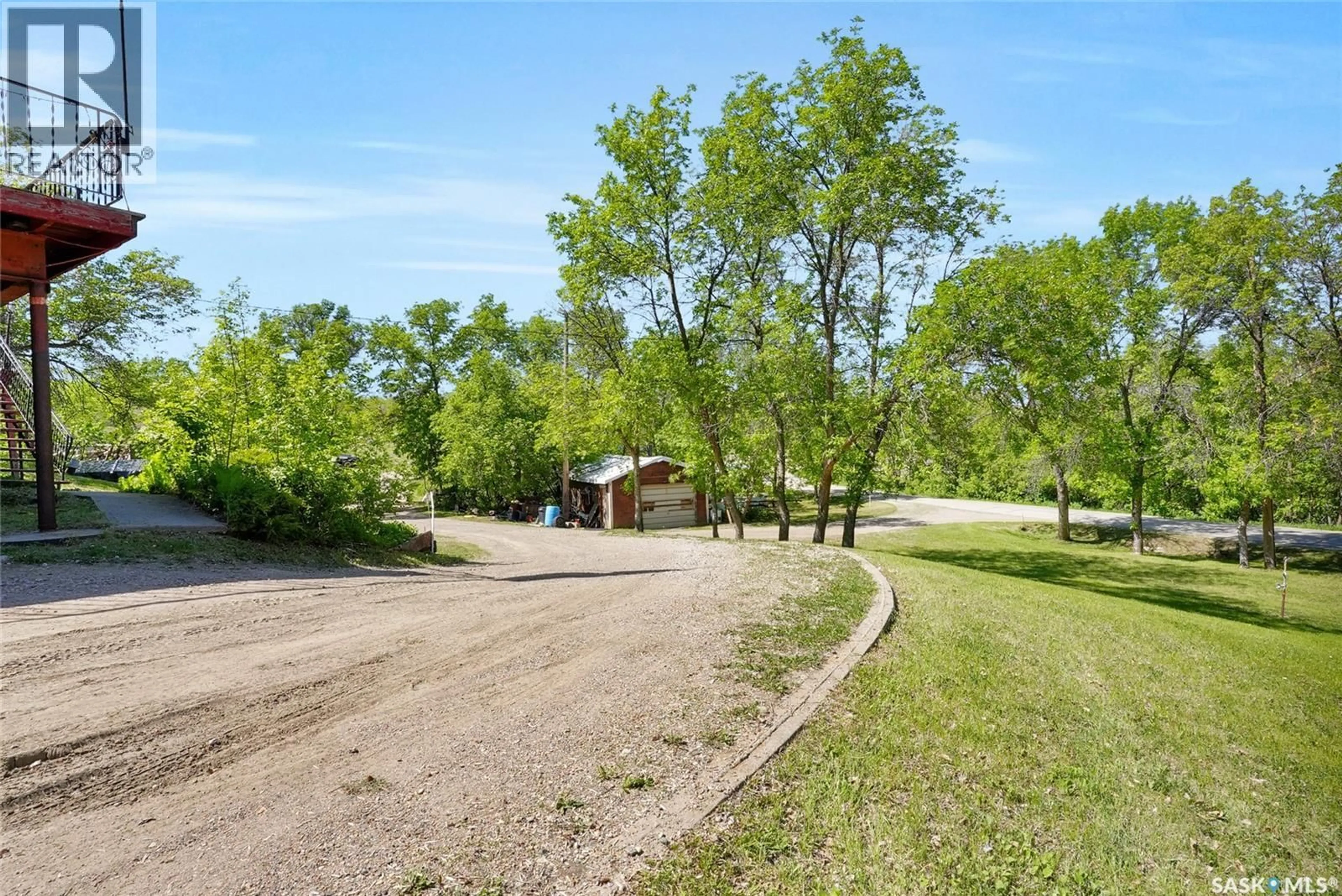 A pic from outside/outdoor area/front of a property/back of a property/a pic from drone, unknown for 701 TATANKA DRIVE, Buffalo Pound Lake Saskatchewan S6H0H0