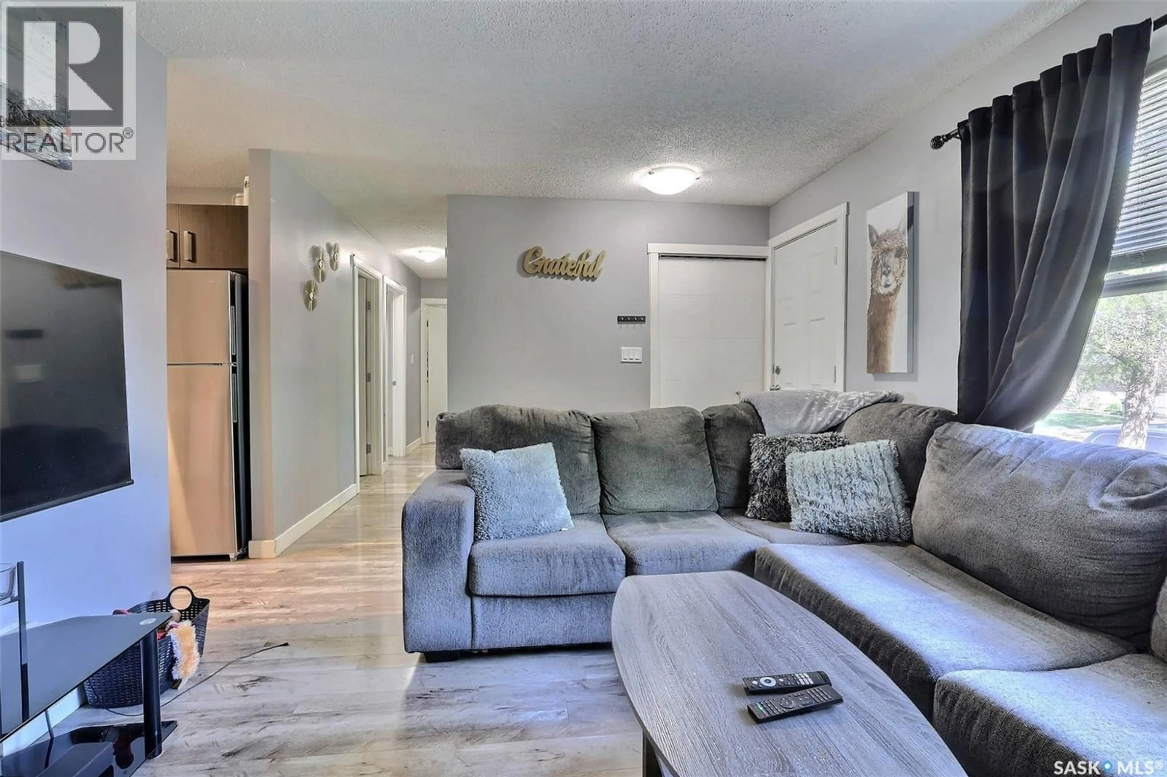 Living room with furniture, unknown for 31 PAYNTER CRESCENT, Regina Saskatchewan S4X1H5