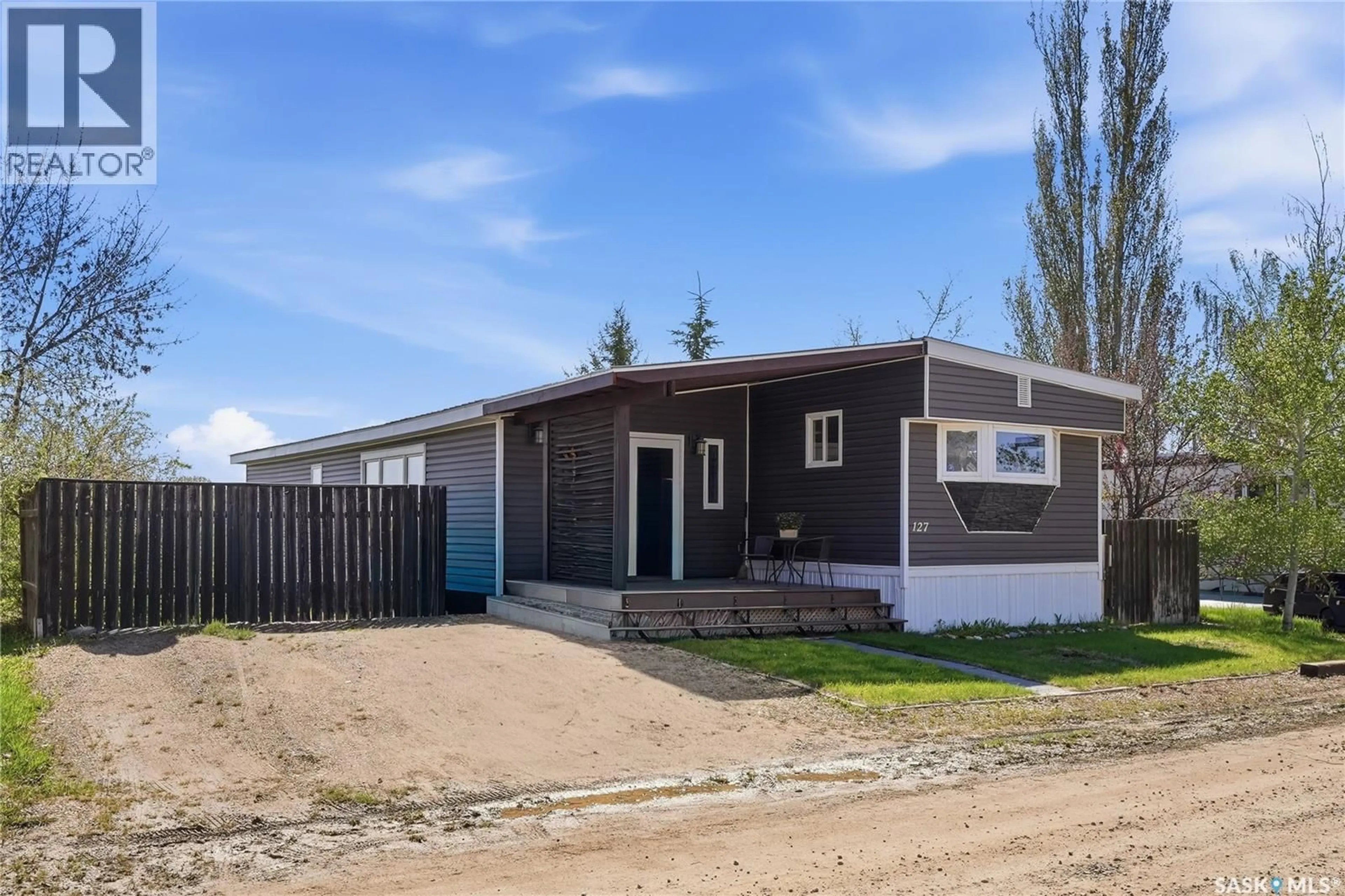 Home with vinyl exterior material, street for 127 SYCAMORE DRIVE, Blucher Rm No. 343 Saskatchewan S7B0A4