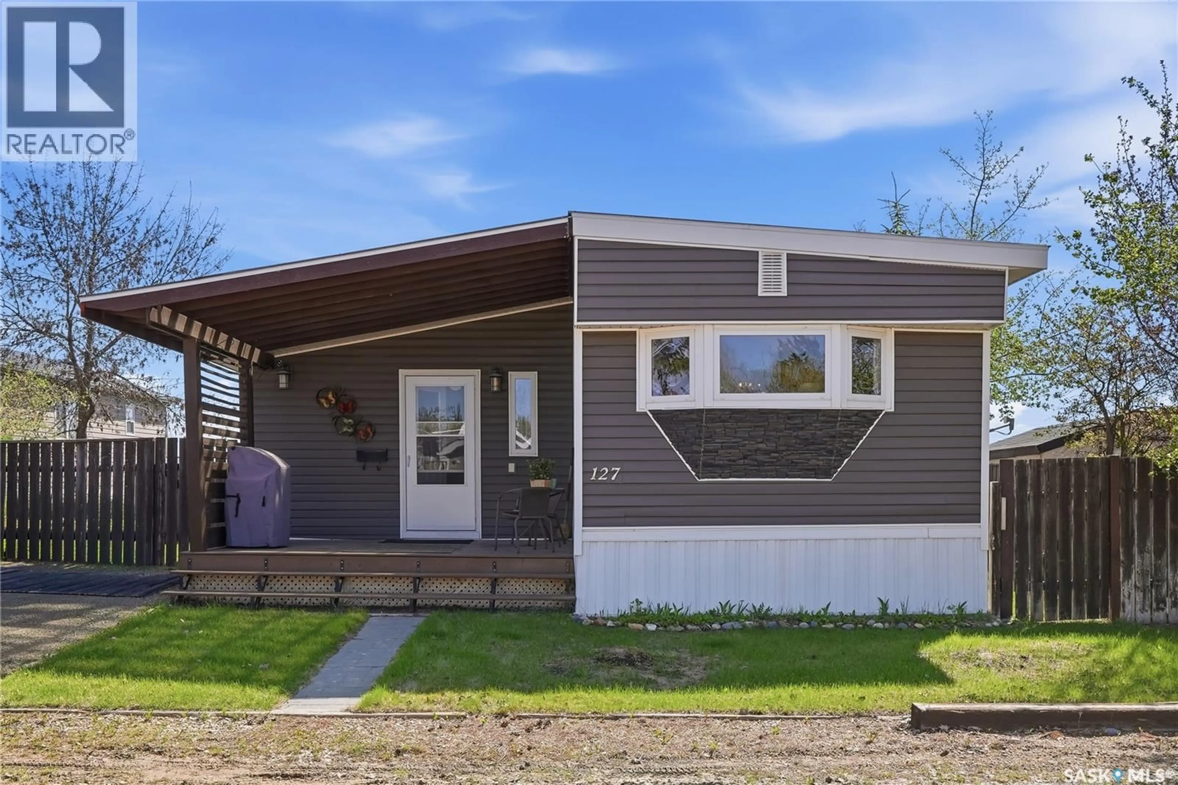Home with vinyl exterior material, street for 127 SYCAMORE DRIVE, Blucher Rm No. 343 Saskatchewan S7B0A4