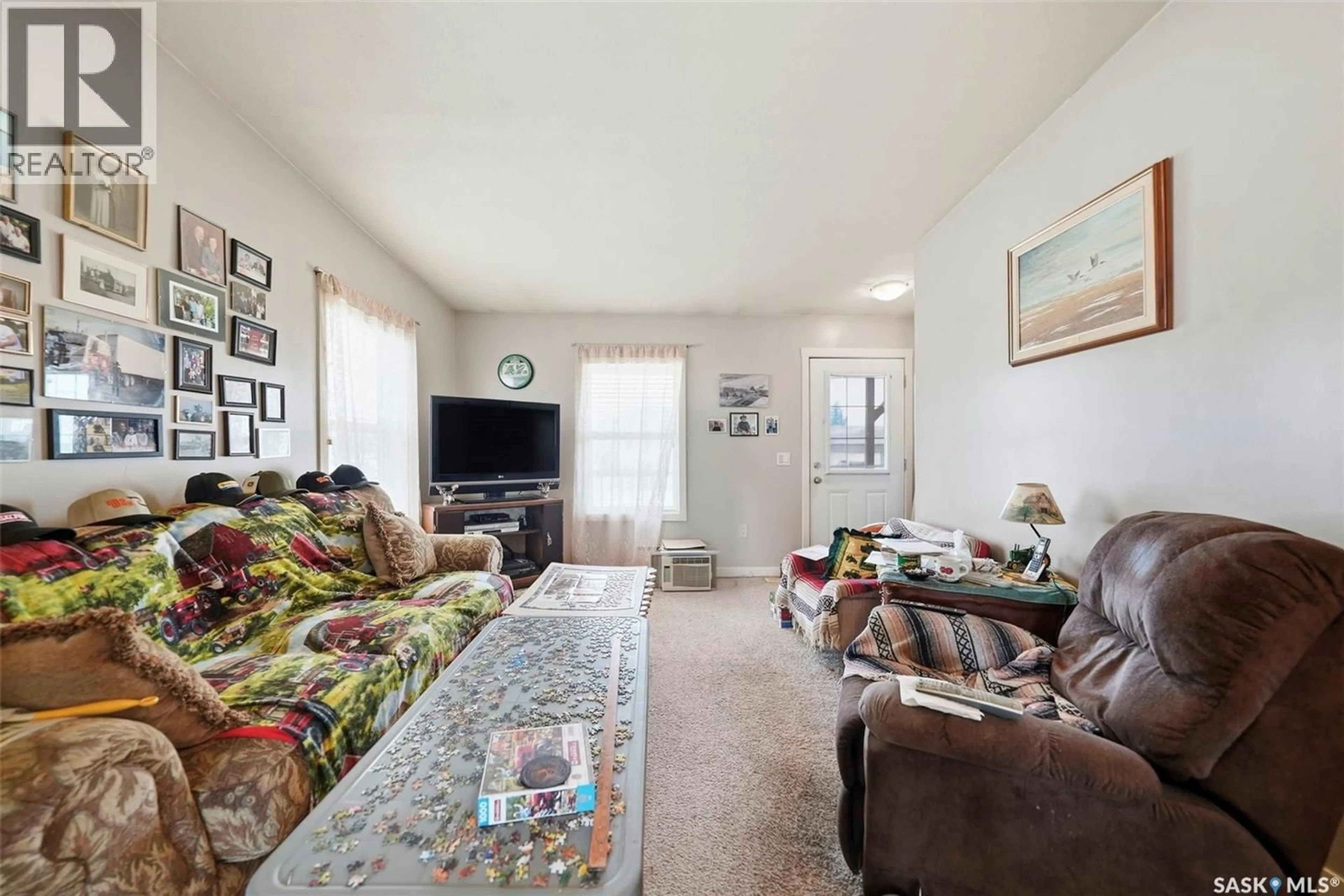 Living room with furniture, unknown for 409 8TH AVENUE, Watrous Saskatchewan S0K4T0