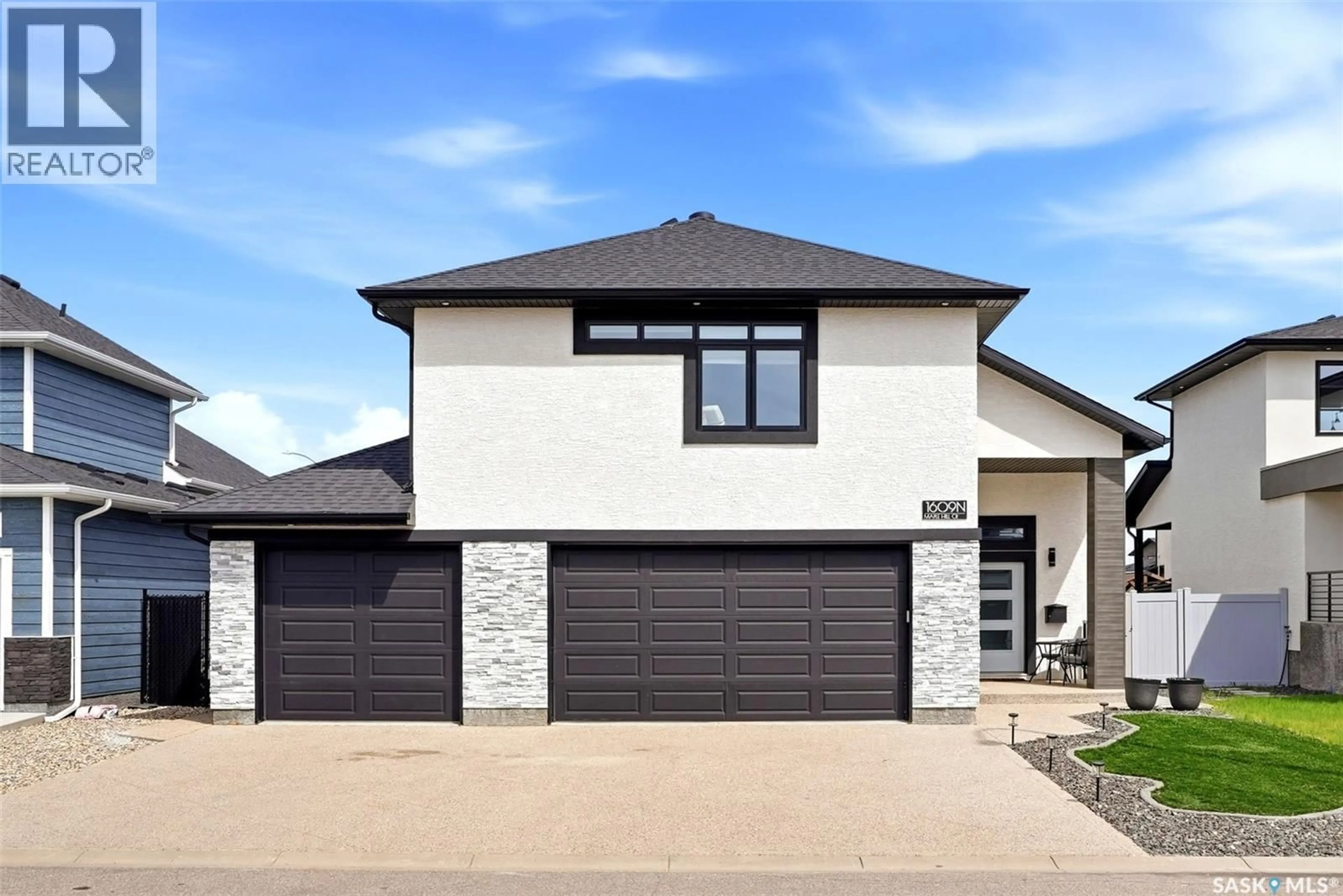 Home with brick exterior material, street for 1609 MAPLE HILL CRESCENT, Regina Saskatchewan S4X0P1