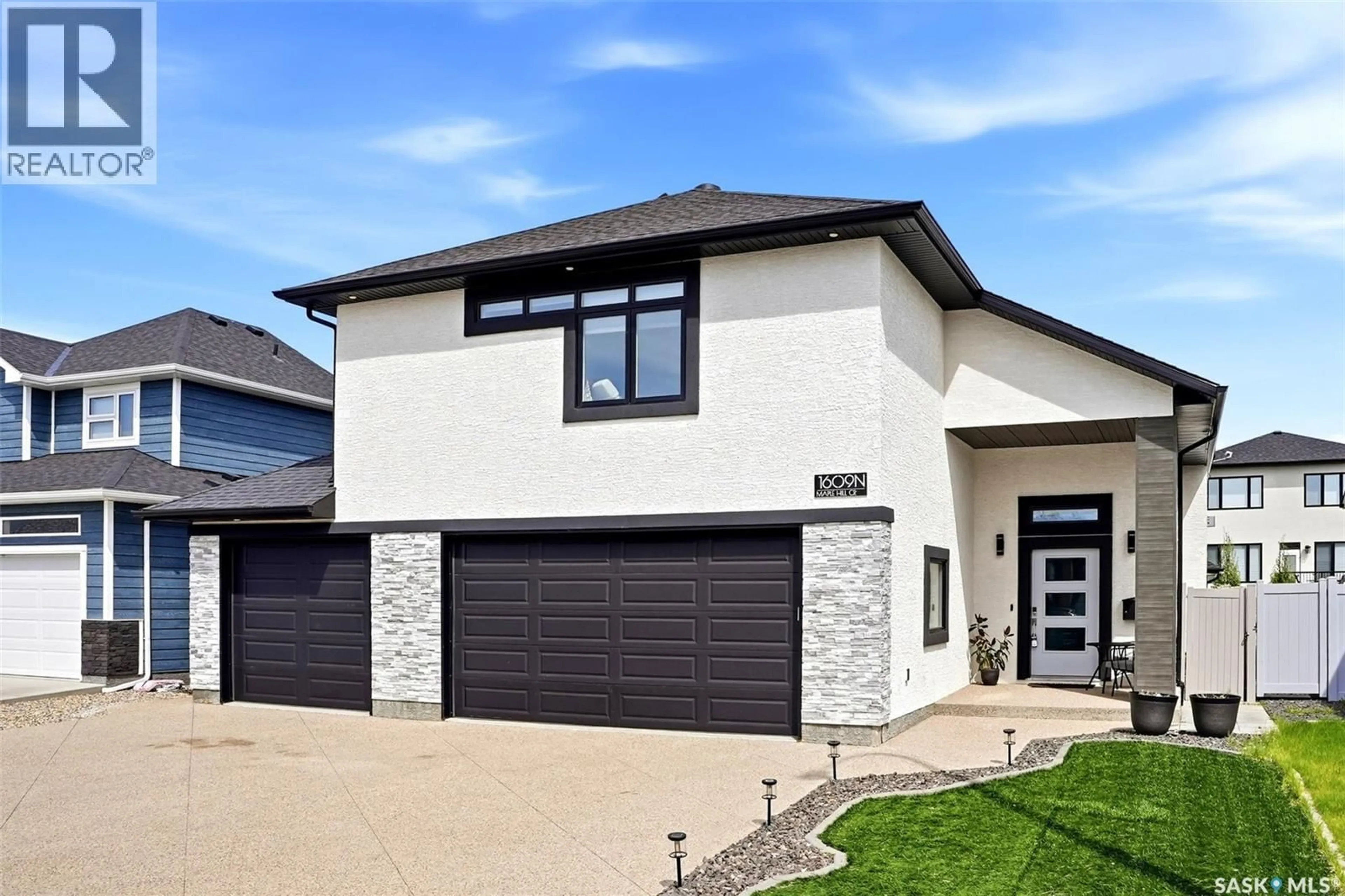 Home with brick exterior material, street for 1609 MAPLE HILL CRESCENT, Regina Saskatchewan S4X0P1