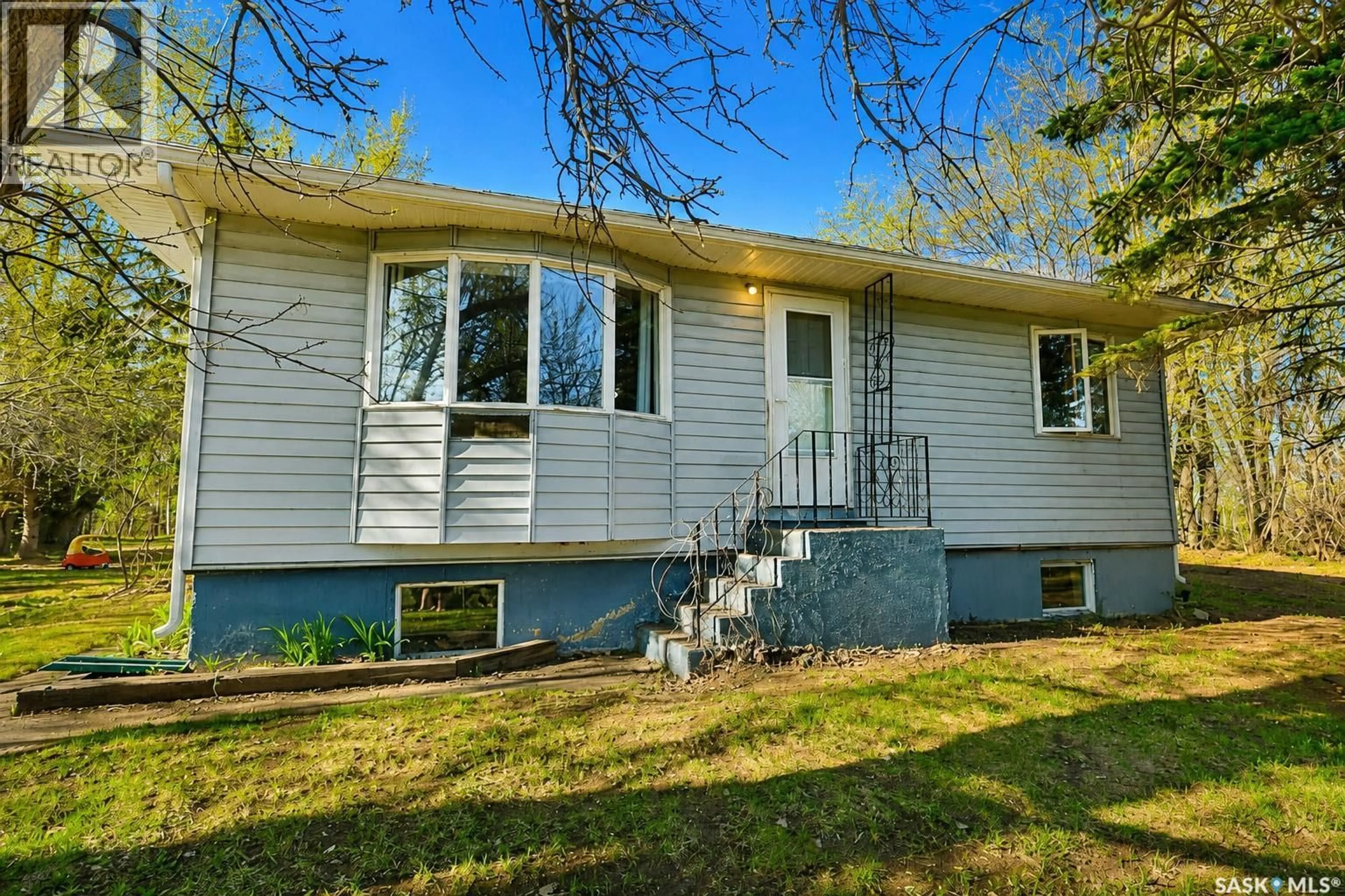 Home with vinyl exterior material, street for 461 PRINCE ALBERT RM, Prince Albert Rm No. 461 Saskatchewan S6V5P8