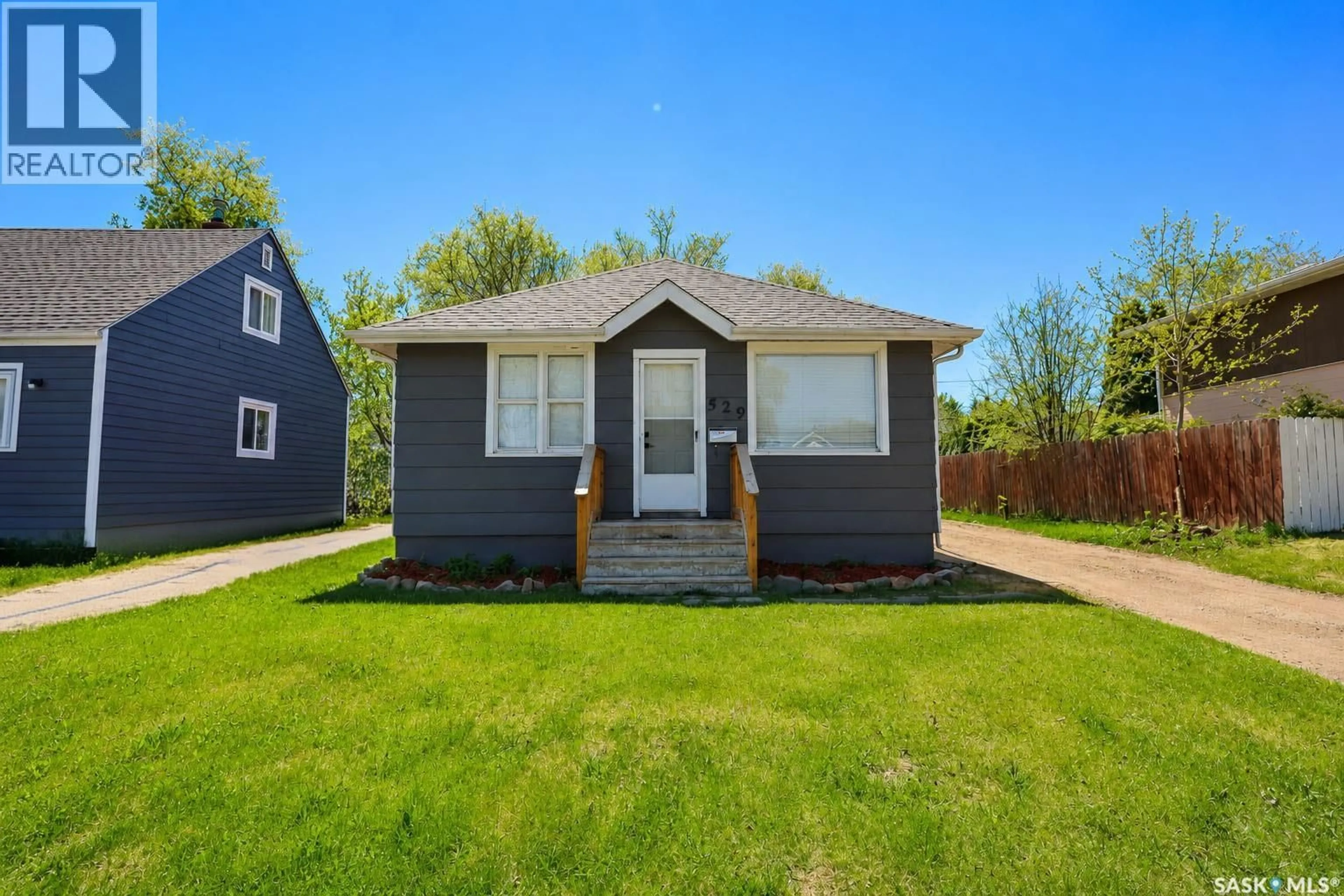 Home with vinyl exterior material, street for 529 20TH STREET, Prince Albert Saskatchewan S6V1L4