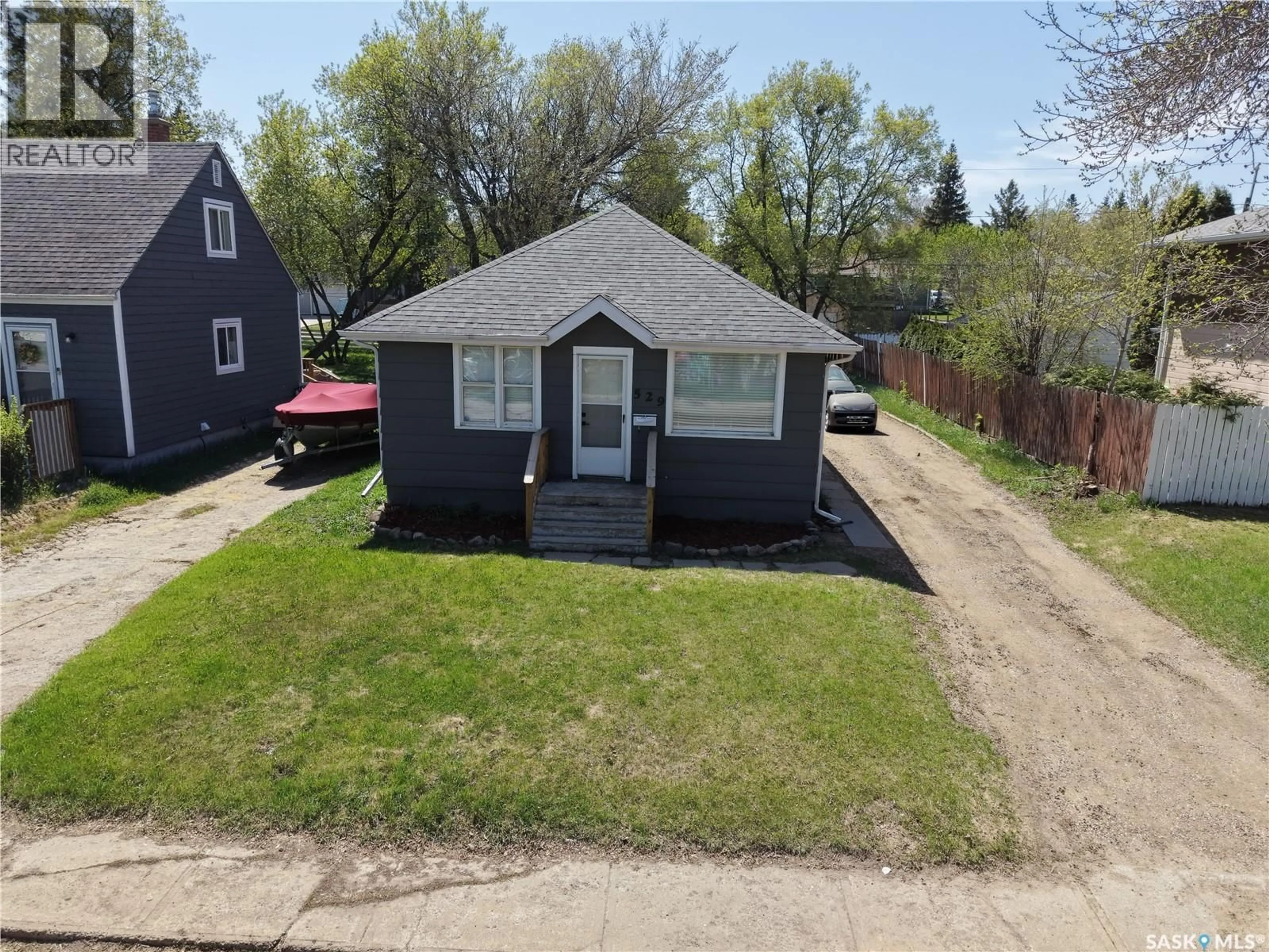 A pic from outside/outdoor area/front of a property/back of a property/a pic from drone, street for 529 20TH STREET, Prince Albert Saskatchewan S6V1L4