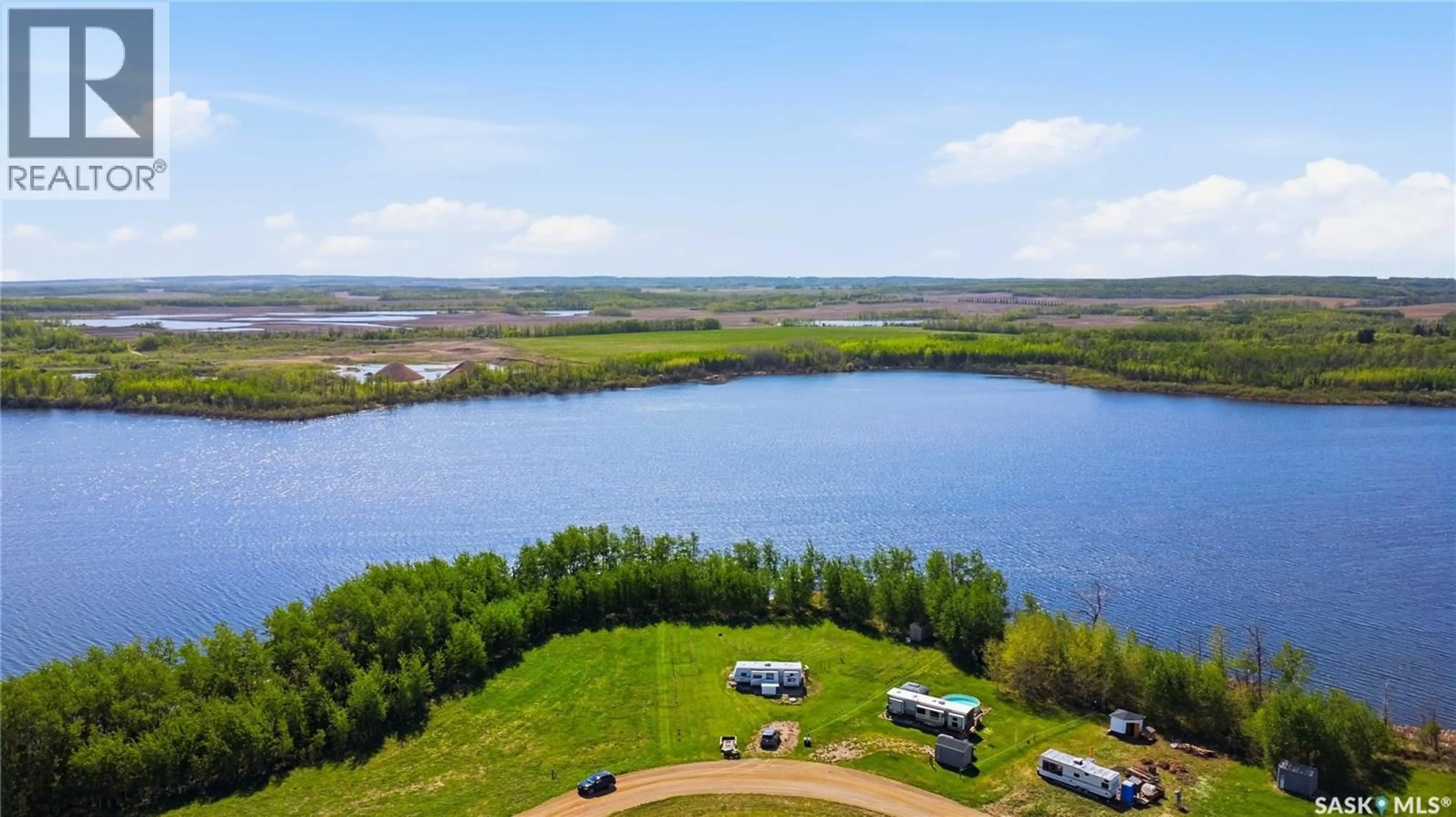 A pic from outside/outdoor area/front of a property/back of a property/a pic from drone, water/lake/river/ocean view for 28 BOUCHARD LANE, Invergordon Rm No. 430 Saskatchewan S0X1A0