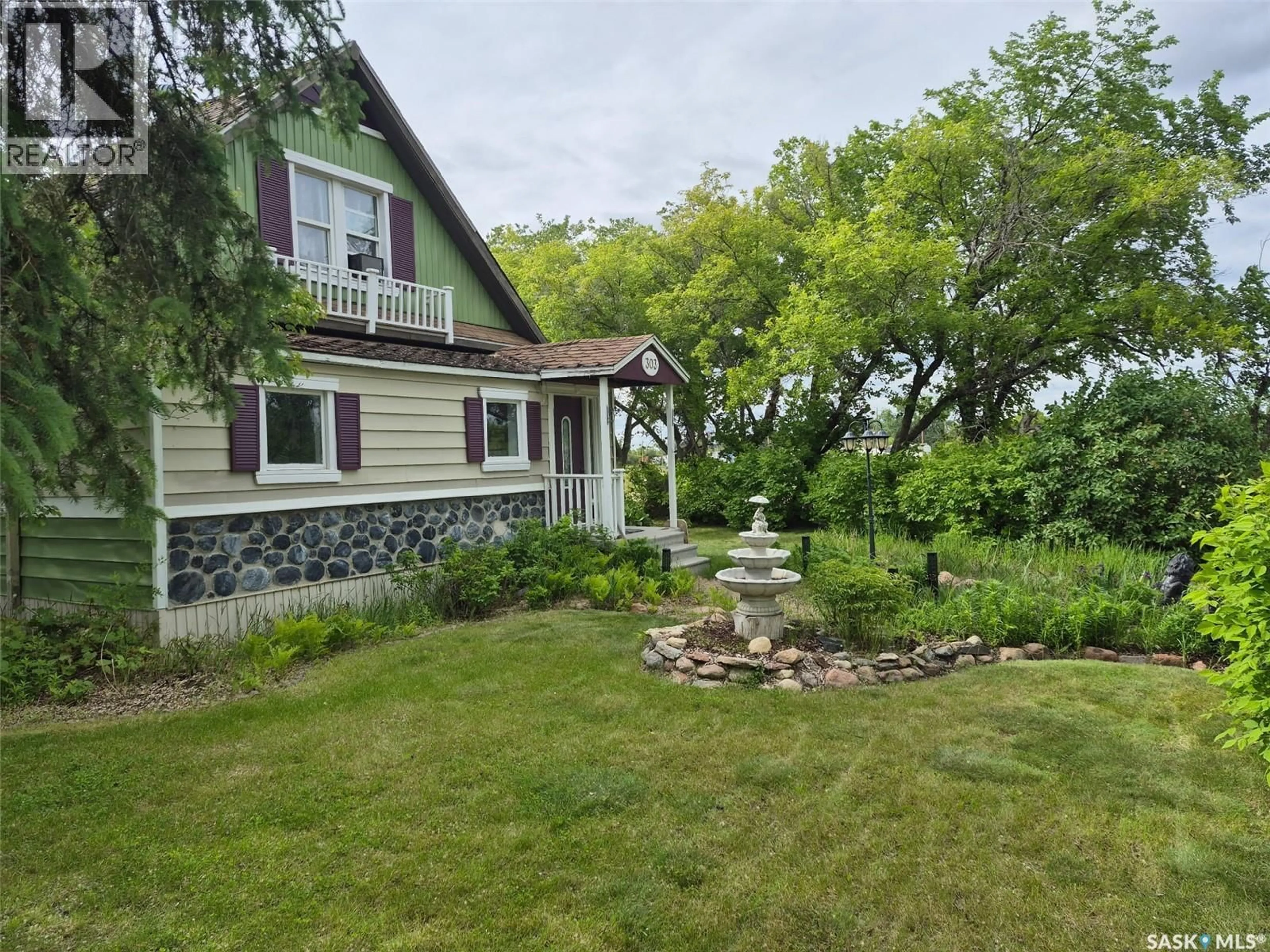 A pic from outside/outdoor area/front of a property/back of a property/a pic from drone, water/lake/river/ocean view for 303 EDWARD STREET, Radisson Saskatchewan S0K3L0
