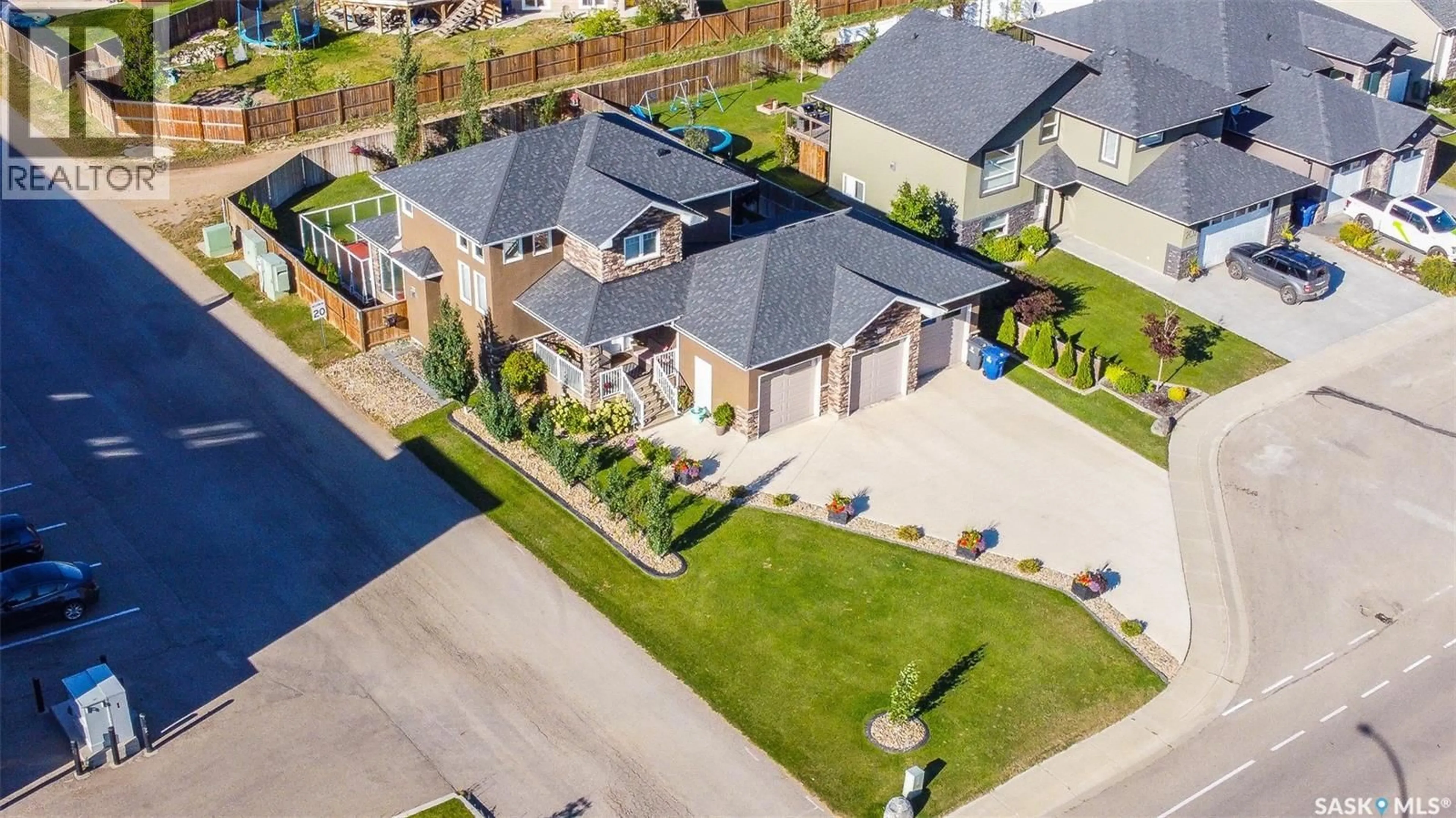 A pic from outside/outdoor area/front of a property/back of a property/a pic from drone, street for 200 CLUBHOUSE BOULEVARD, Warman Saskatchewan S0K4S1