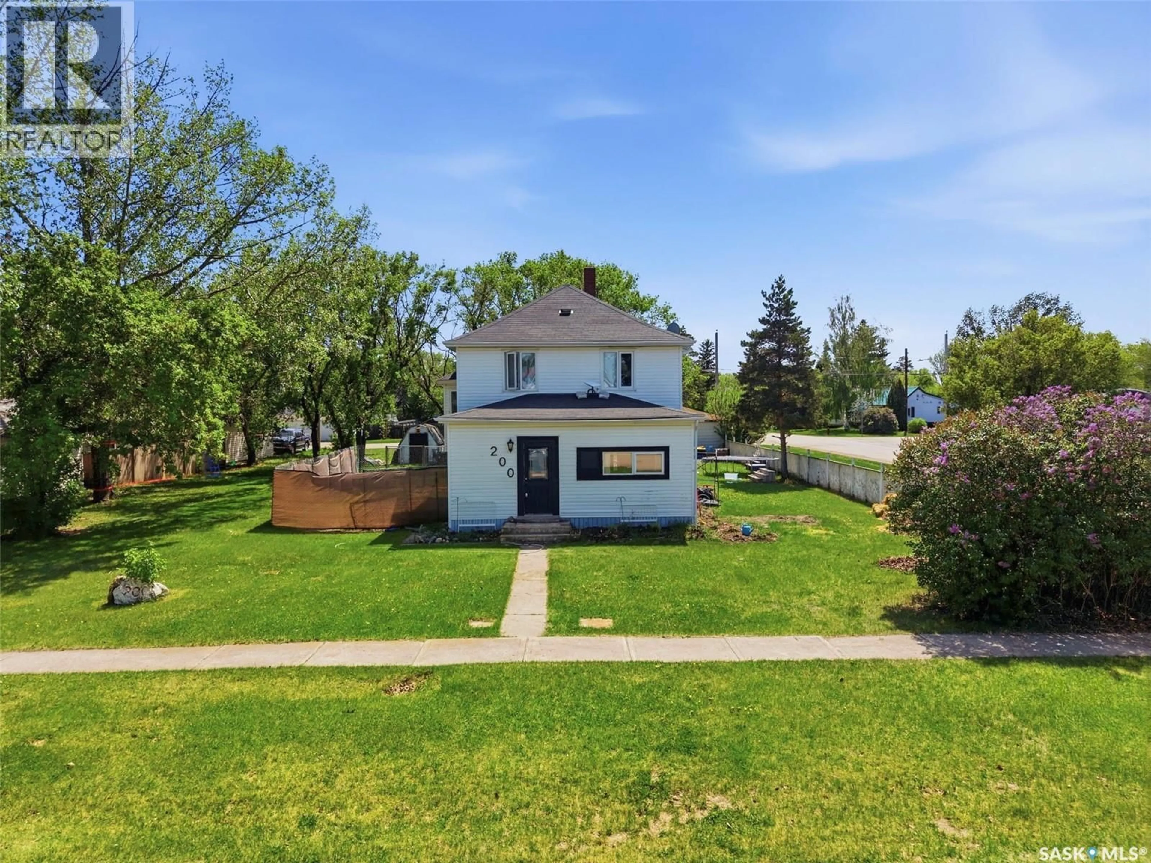 A pic from outside/outdoor area/front of a property/back of a property/a pic from drone, street for 200 1ST STREET, Dundurn Saskatchewan S0K1K0