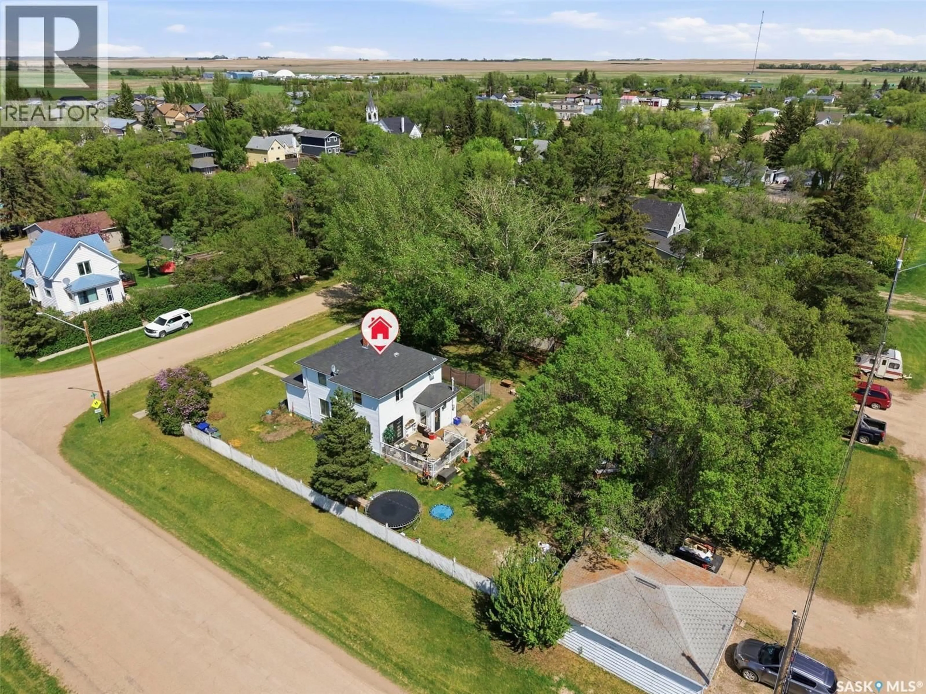 A pic from outside/outdoor area/front of a property/back of a property/a pic from drone, street for 200 1ST STREET, Dundurn Saskatchewan S0K1K0