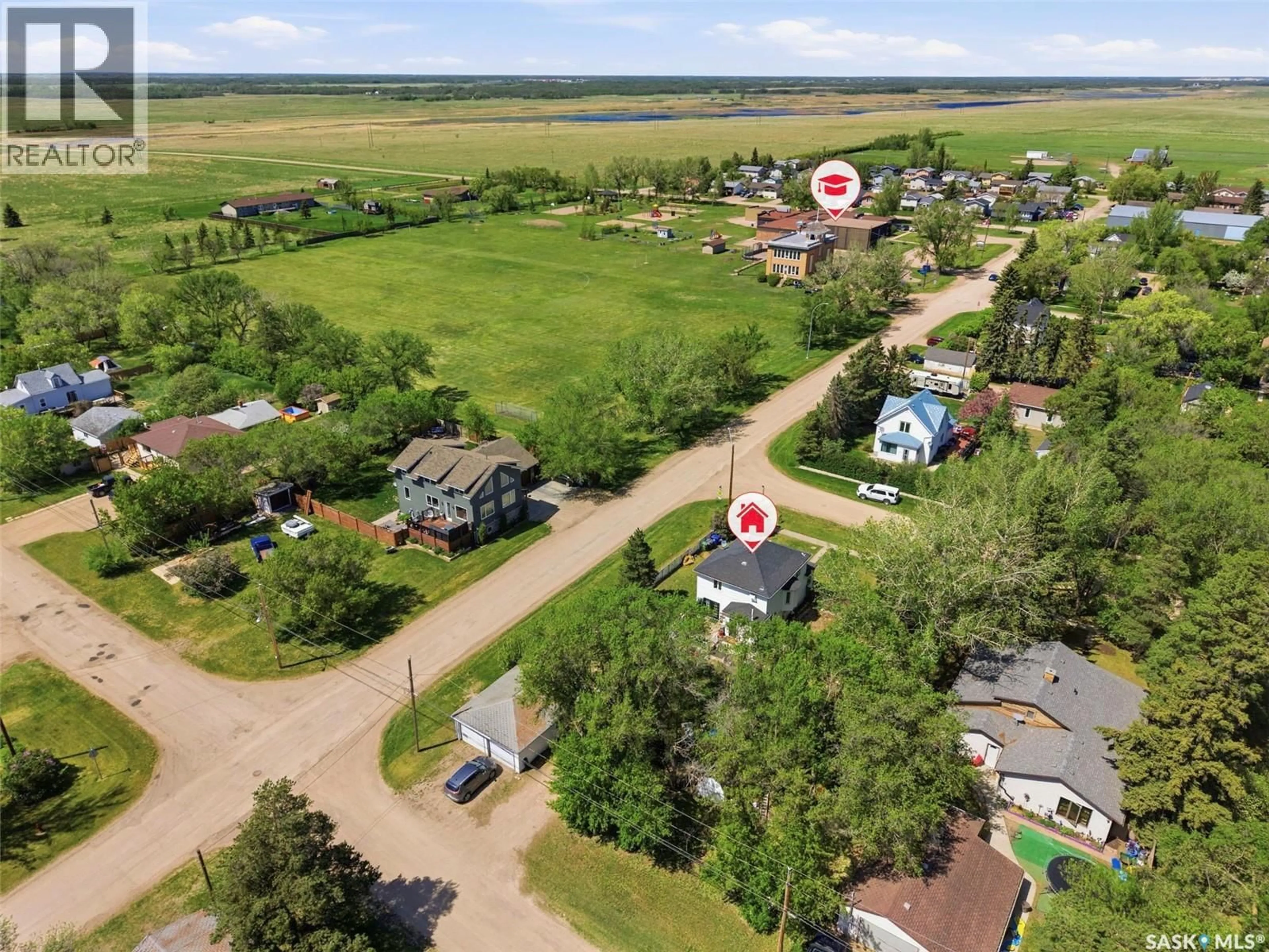 A pic from outside/outdoor area/front of a property/back of a property/a pic from drone, street for 200 1ST STREET, Dundurn Saskatchewan S0K1K0