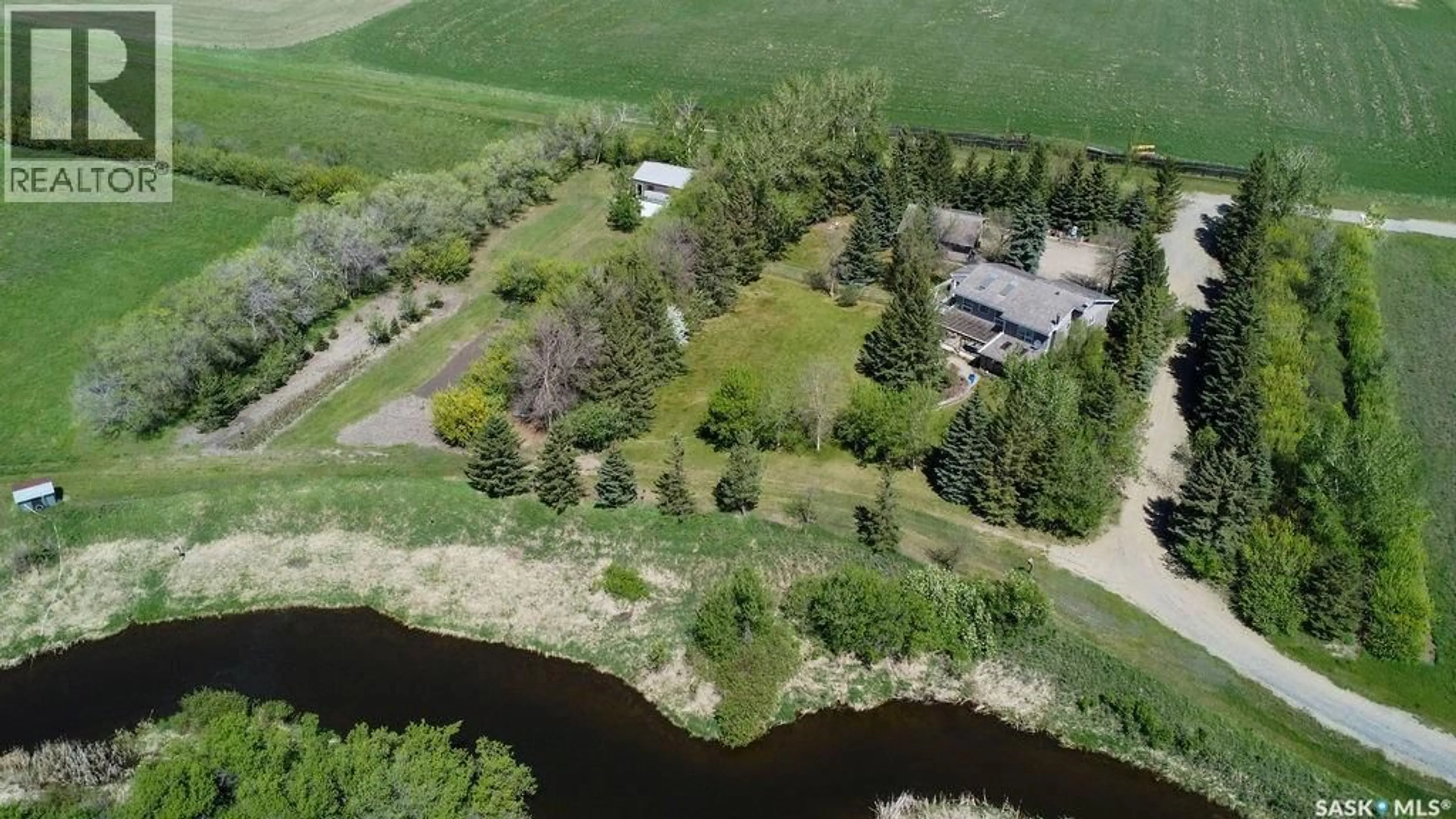 A pic from outside/outdoor area/front of a property/back of a property/a pic from drone, water/lake/river/ocean view for MCOUATT ACREAGE, Lumsden Rm No. 189 Saskatchewan S4P2Z2