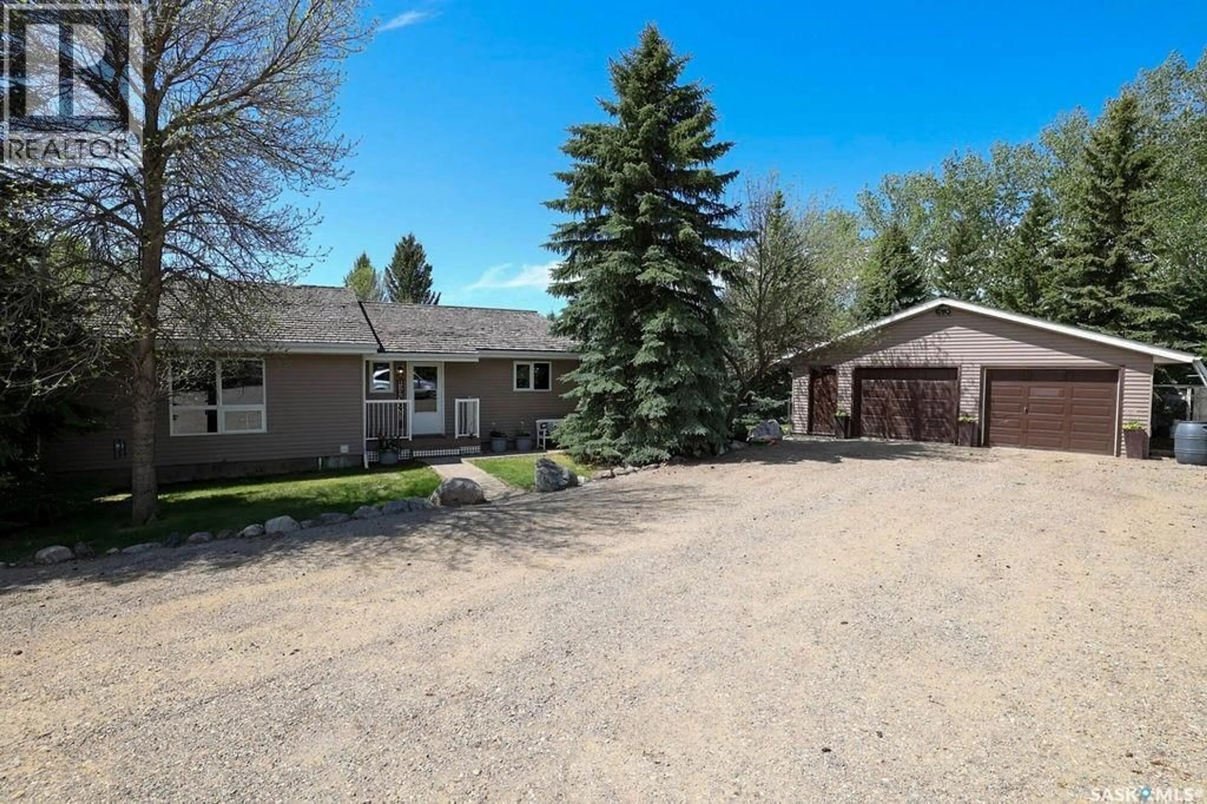 A pic from outside/outdoor area/front of a property/back of a property/a pic from drone, unknown for MCOUATT ACREAGE, Lumsden Rm No. 189 Saskatchewan S4P2Z2