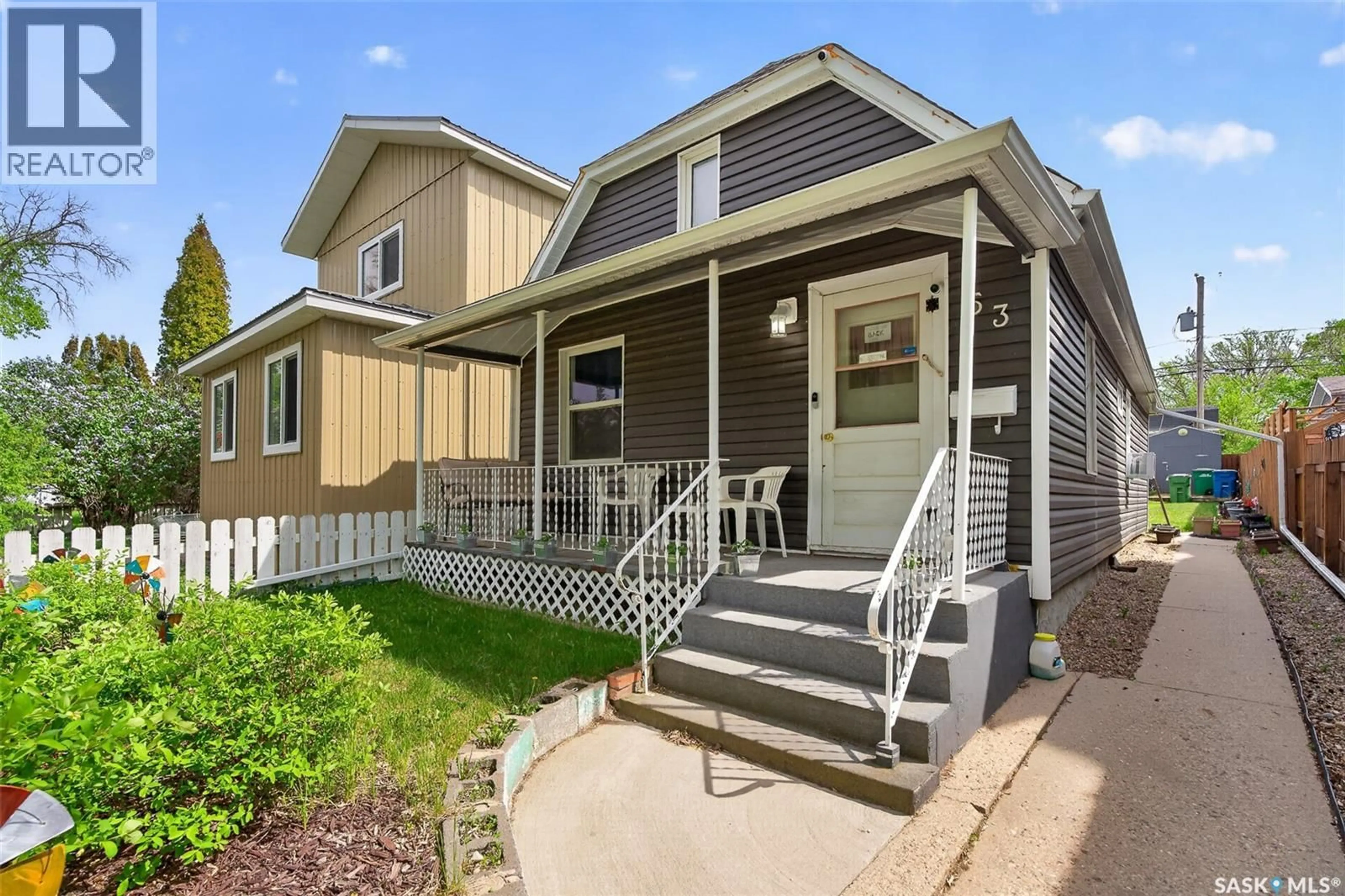 Home with vinyl exterior material, street for 53 LILLOOET STREET E, Moose Jaw Saskatchewan S6H4S3