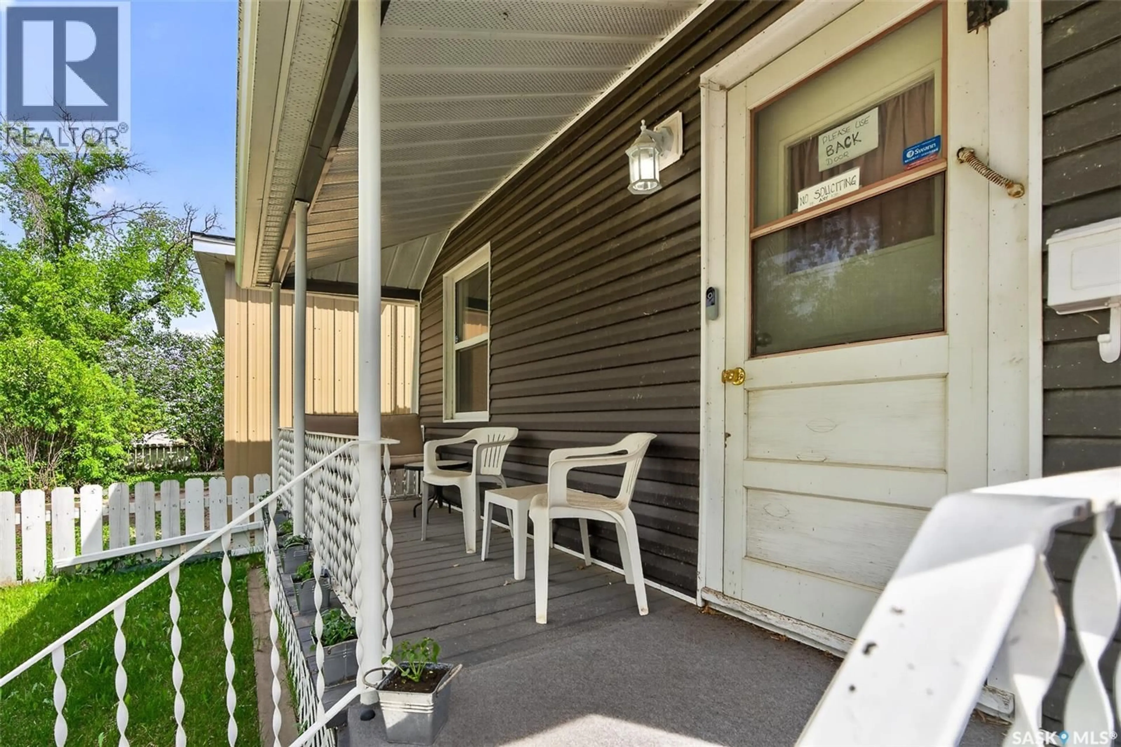 Patio, street for 53 LILLOOET STREET E, Moose Jaw Saskatchewan S6H4S3