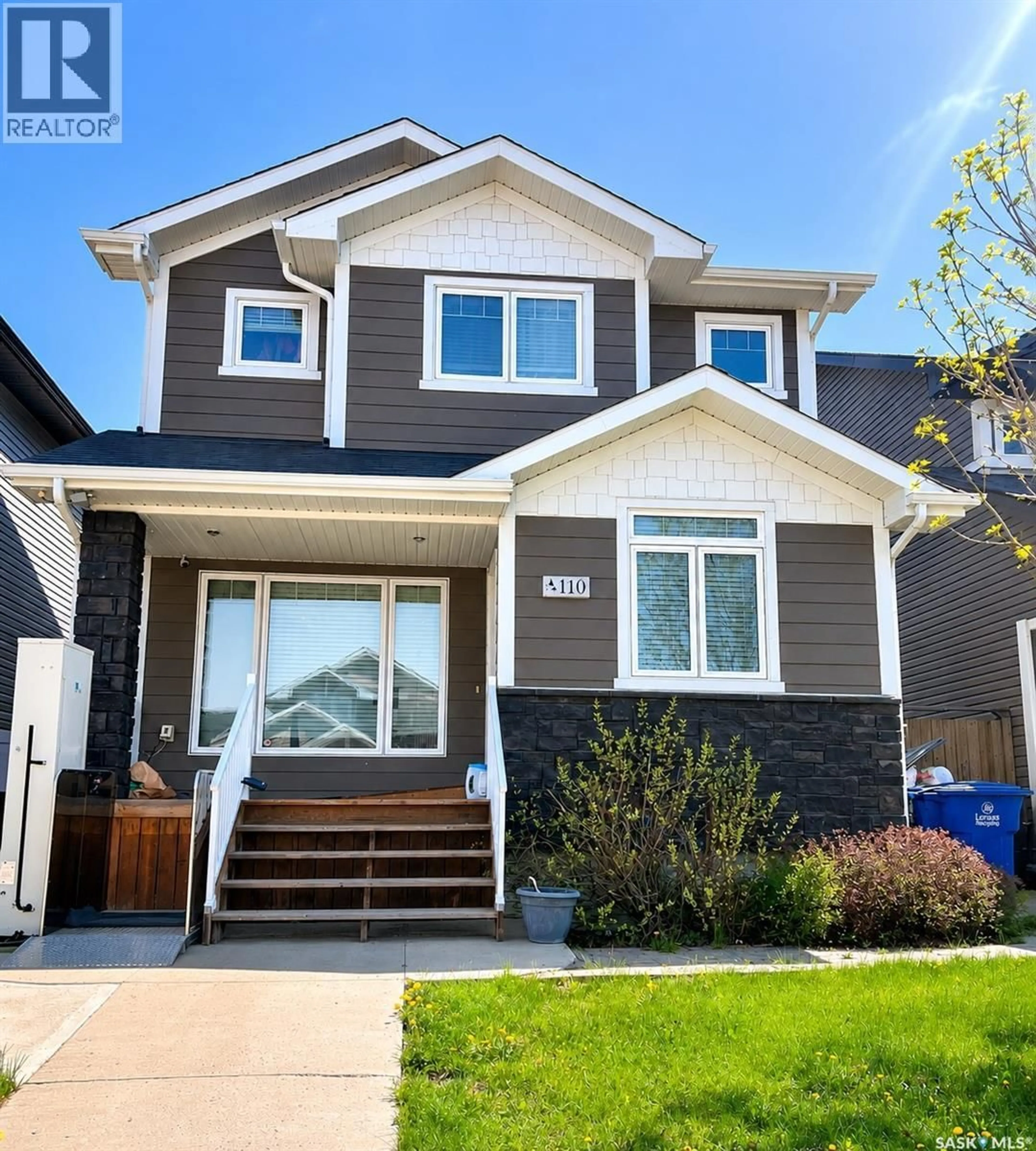 Home with vinyl exterior material, street for 110 CHILDERS CRESCENT, Saskatoon Saskatchewan S7L3G4
