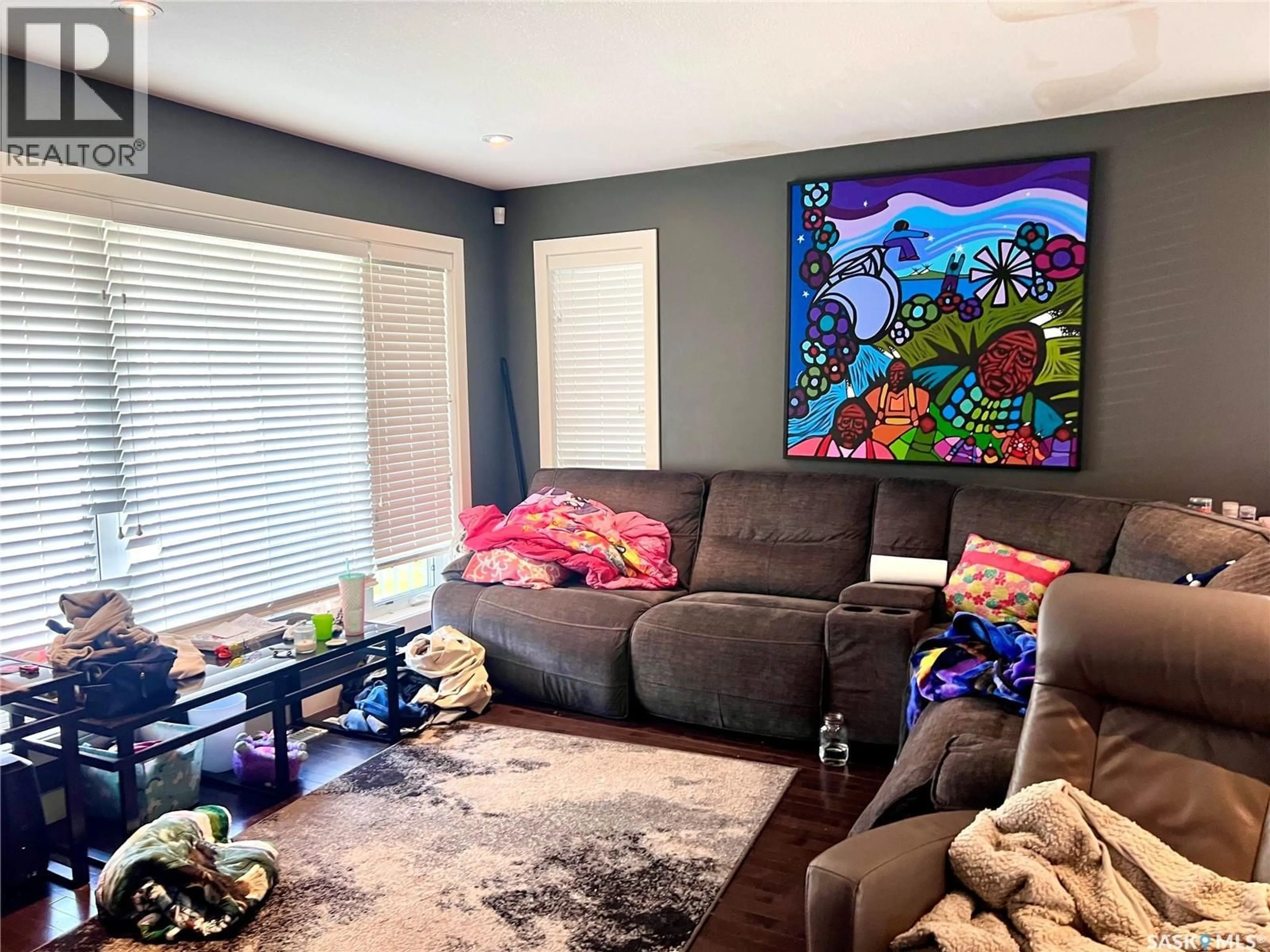 Living room with furniture, unknown for 110 CHILDERS CRESCENT, Saskatoon Saskatchewan S7L3G4