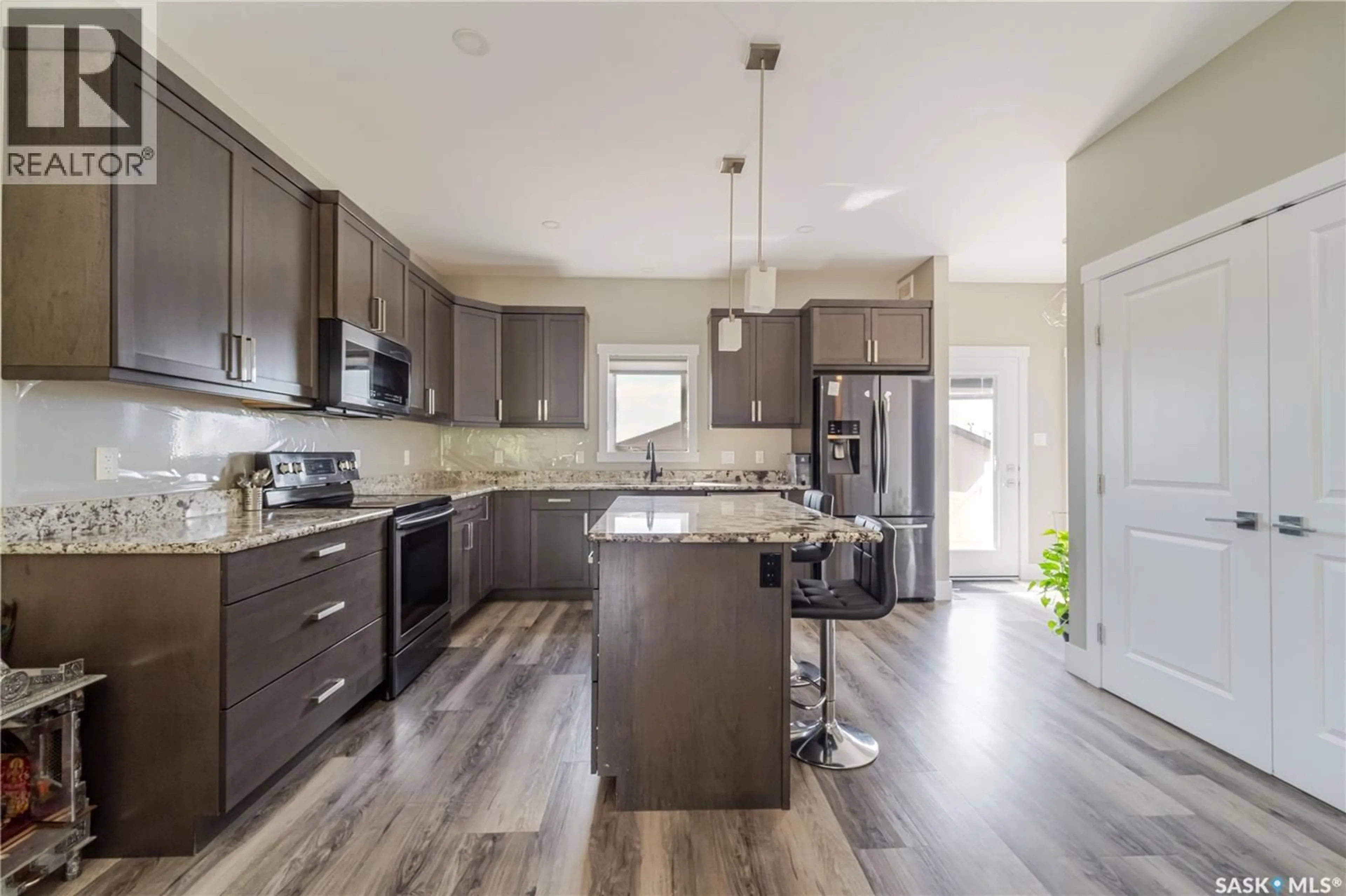 Open concept kitchen, unknown for 1750 11TH AVENUE, Moose Jaw Saskatchewan S6J0B3