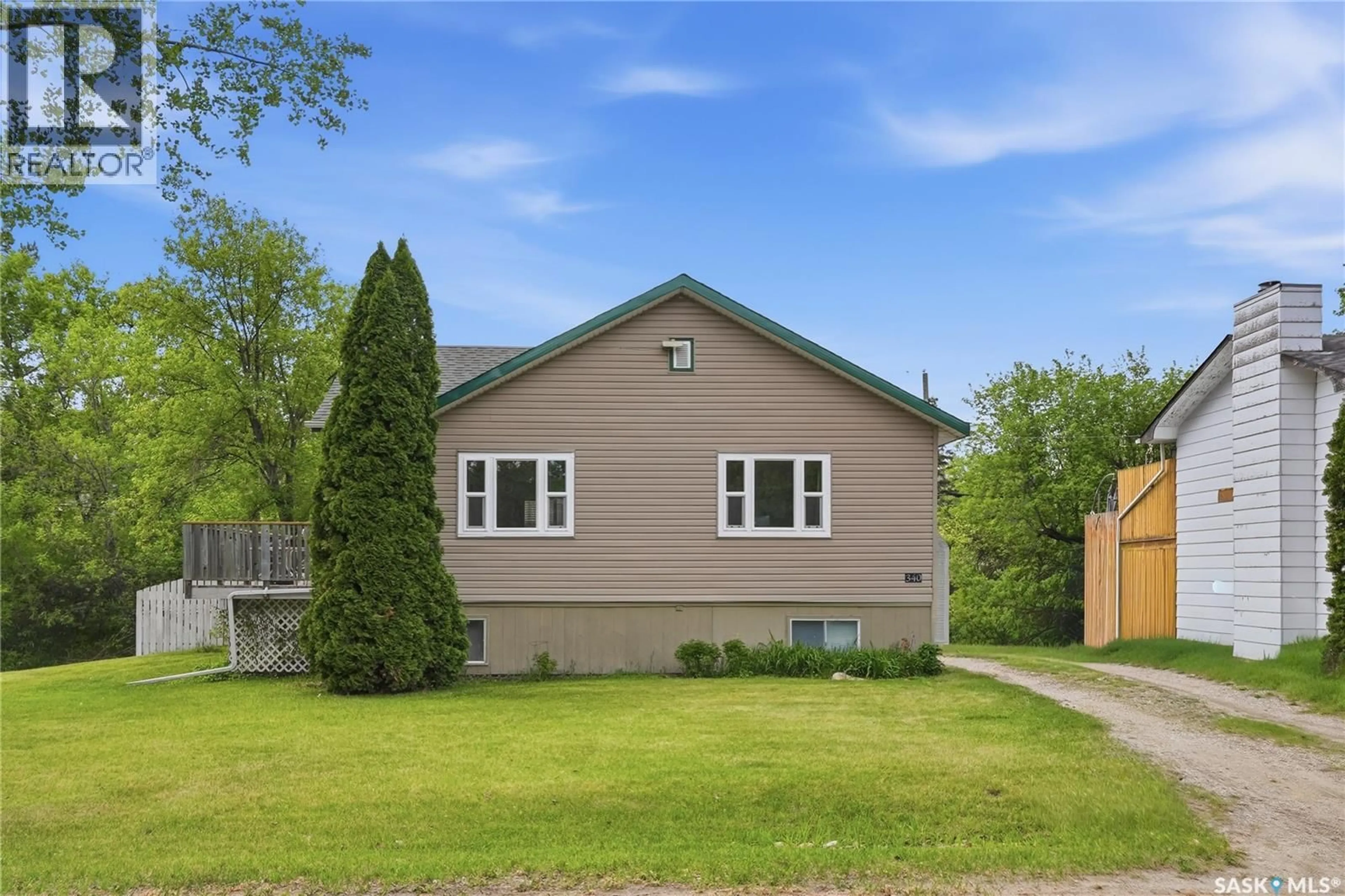 Home with vinyl exterior material, street for 340 CHARLES STREET, Asquith Saskatchewan S0K0J0