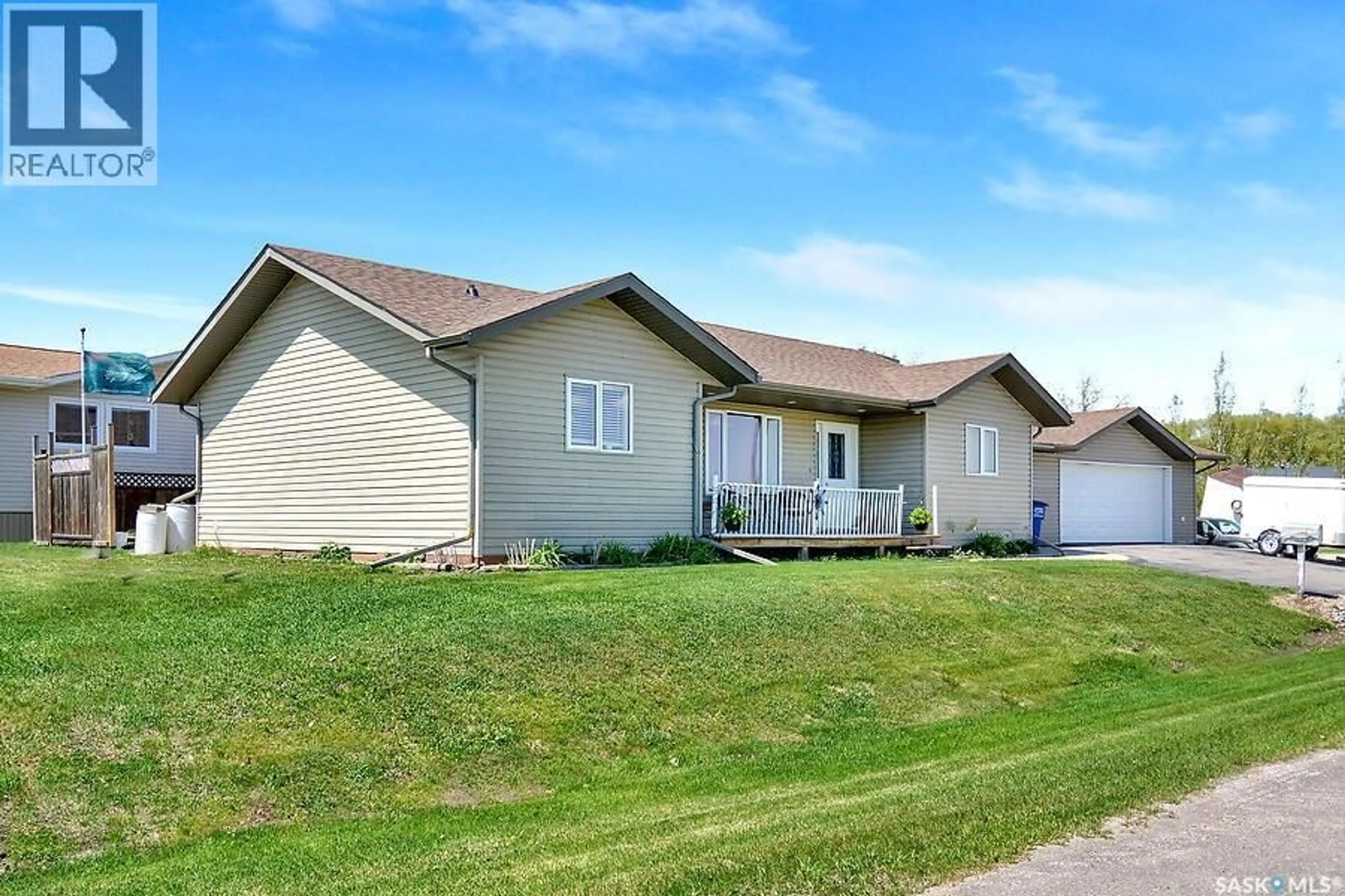 Home with vinyl exterior material, street for 101 WALDBILLIG COURT, Cudworth Saskatchewan S0K1B0