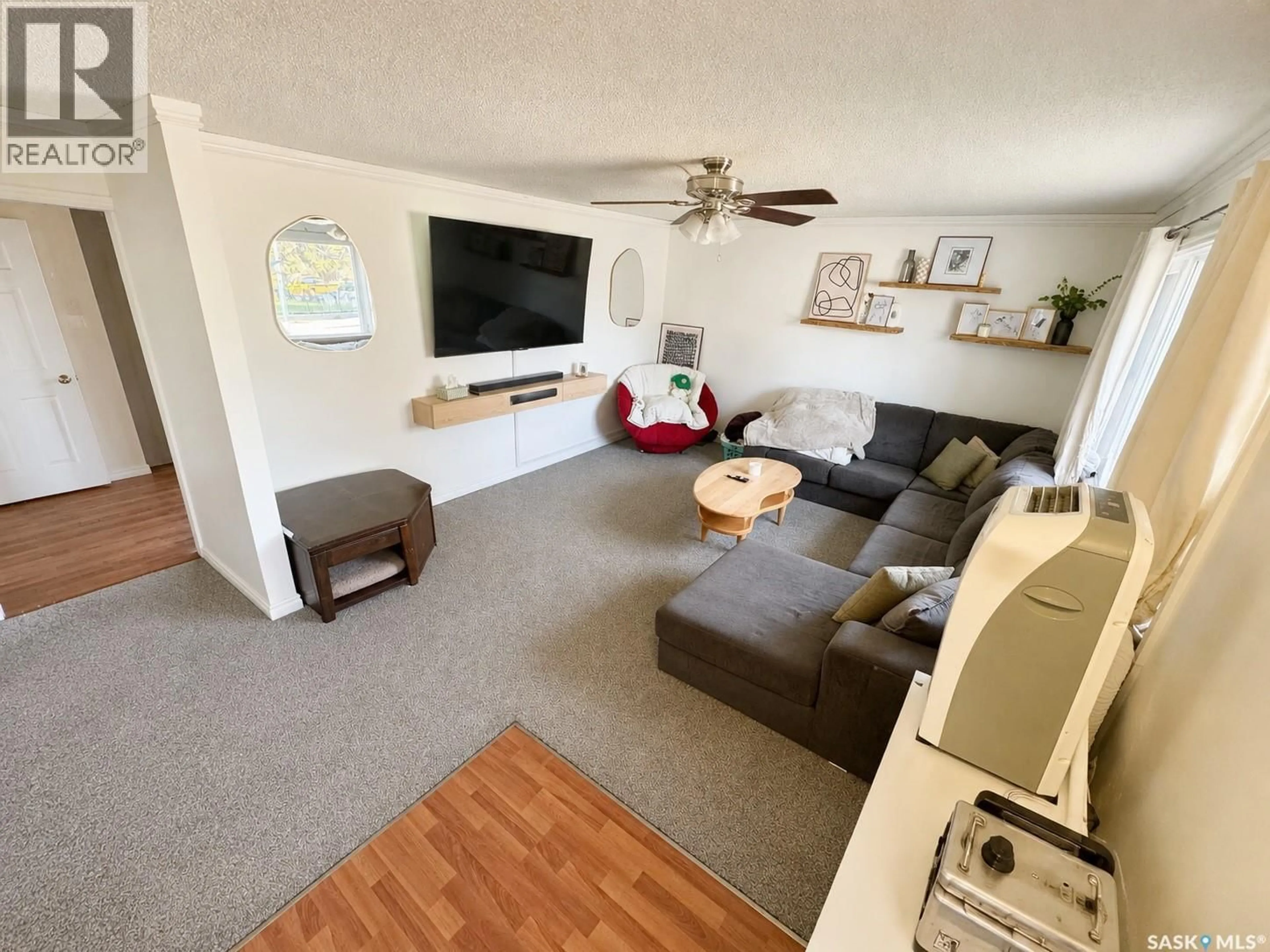 Living room with furniture, unknown for 1410 4TH AVENUE, Regina Saskatchewan S4R0T1