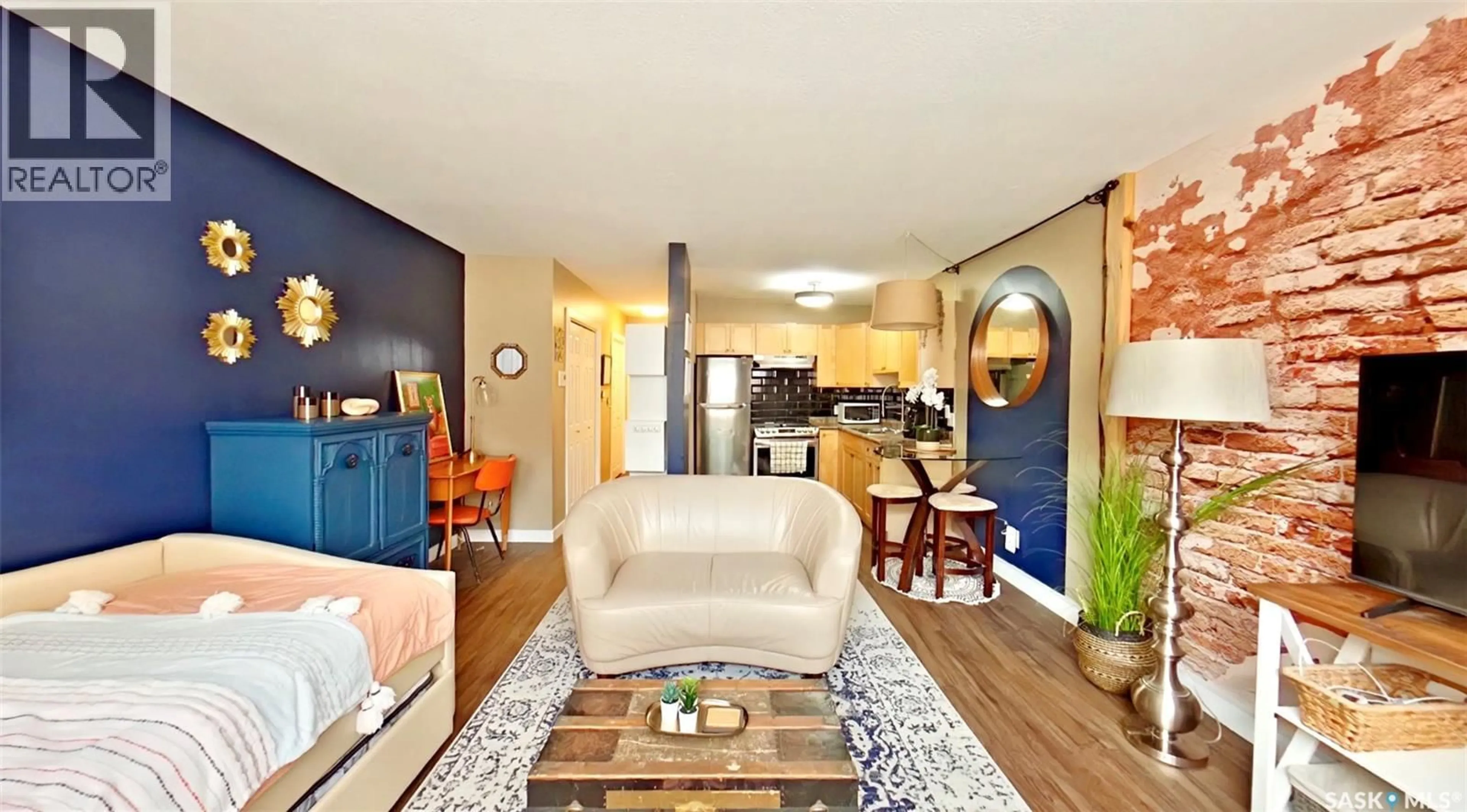 Living room with furniture, wood/laminate floor for 2 2358 RAE STREET, Regina Saskatchewan S4T2G2