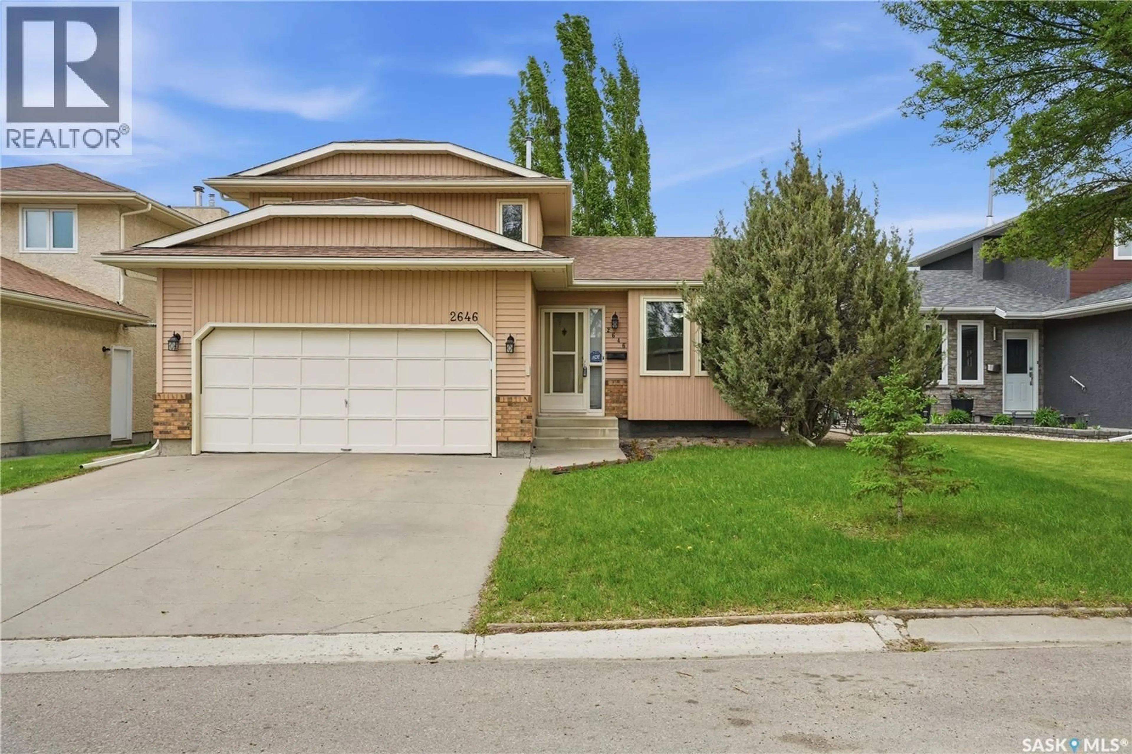 Home with vinyl exterior material, street for 2646 CROCUS DRIVE, Regina Saskatchewan S4V1T2