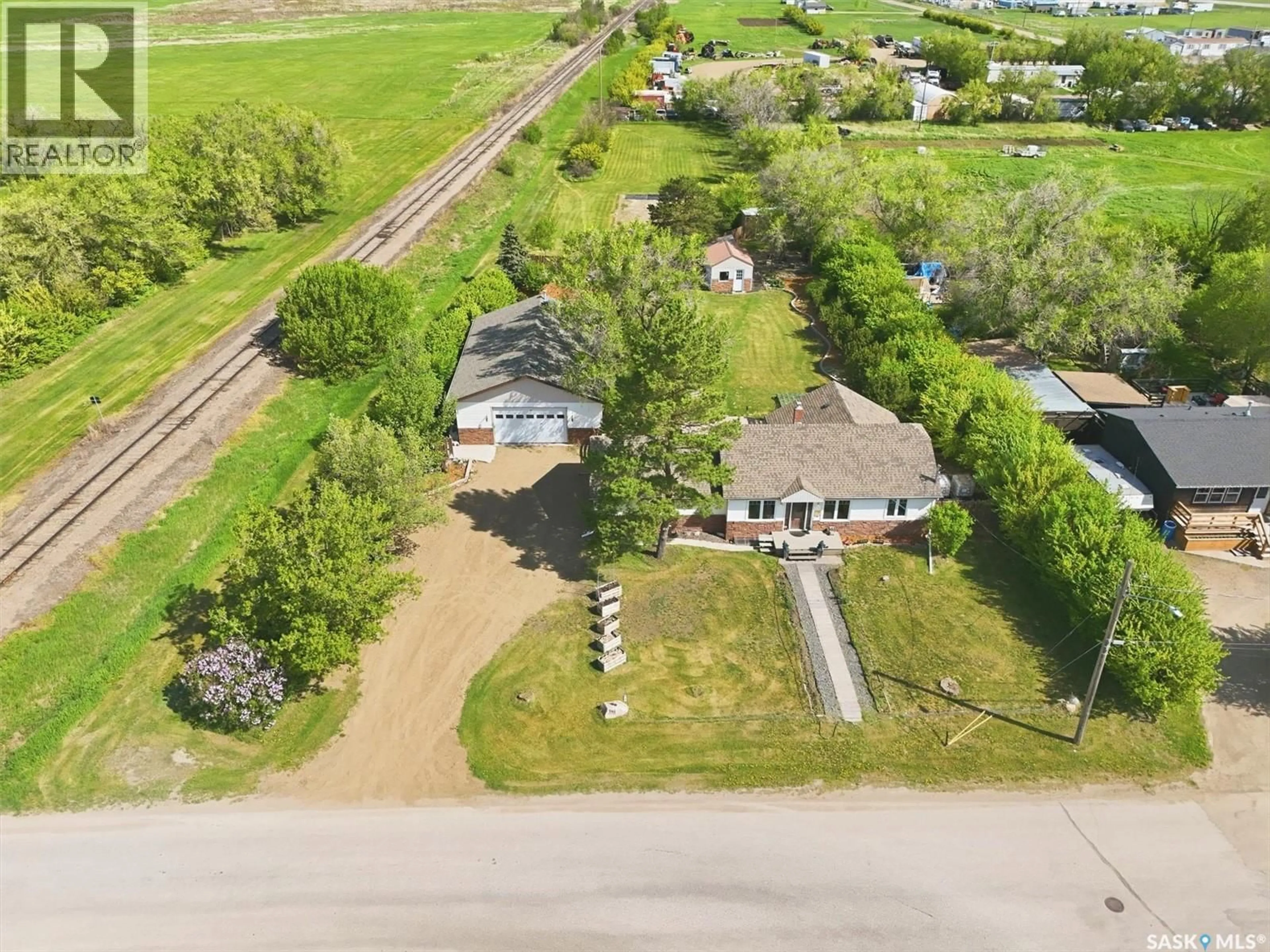 A pic from outside/outdoor area/front of a property/back of a property/a pic from drone, street for 503 3RD STREET, Dundurn Saskatchewan S0K1K0