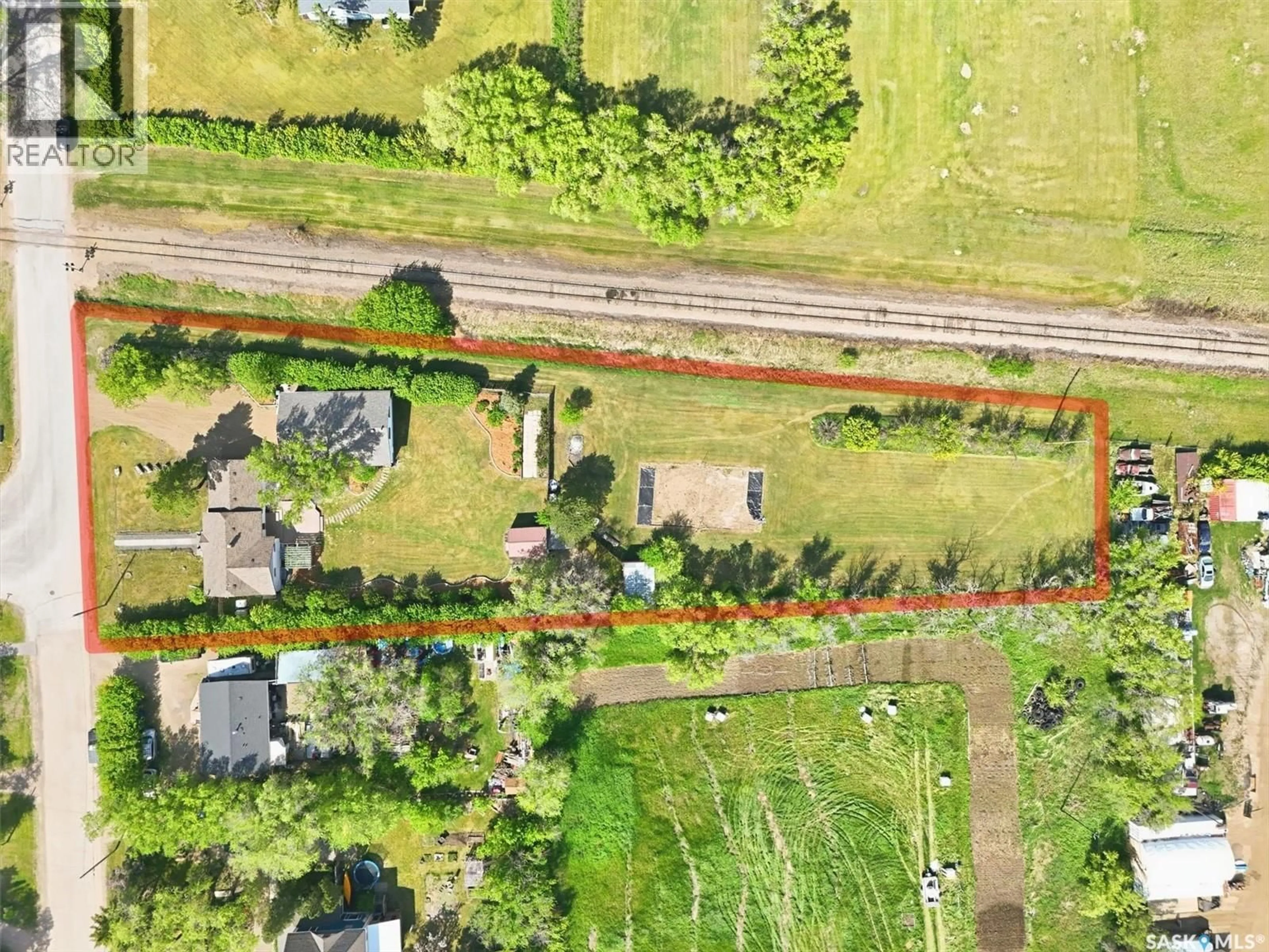 A pic from outside/outdoor area/front of a property/back of a property/a pic from drone, street for 503 3RD STREET, Dundurn Saskatchewan S0K1K0