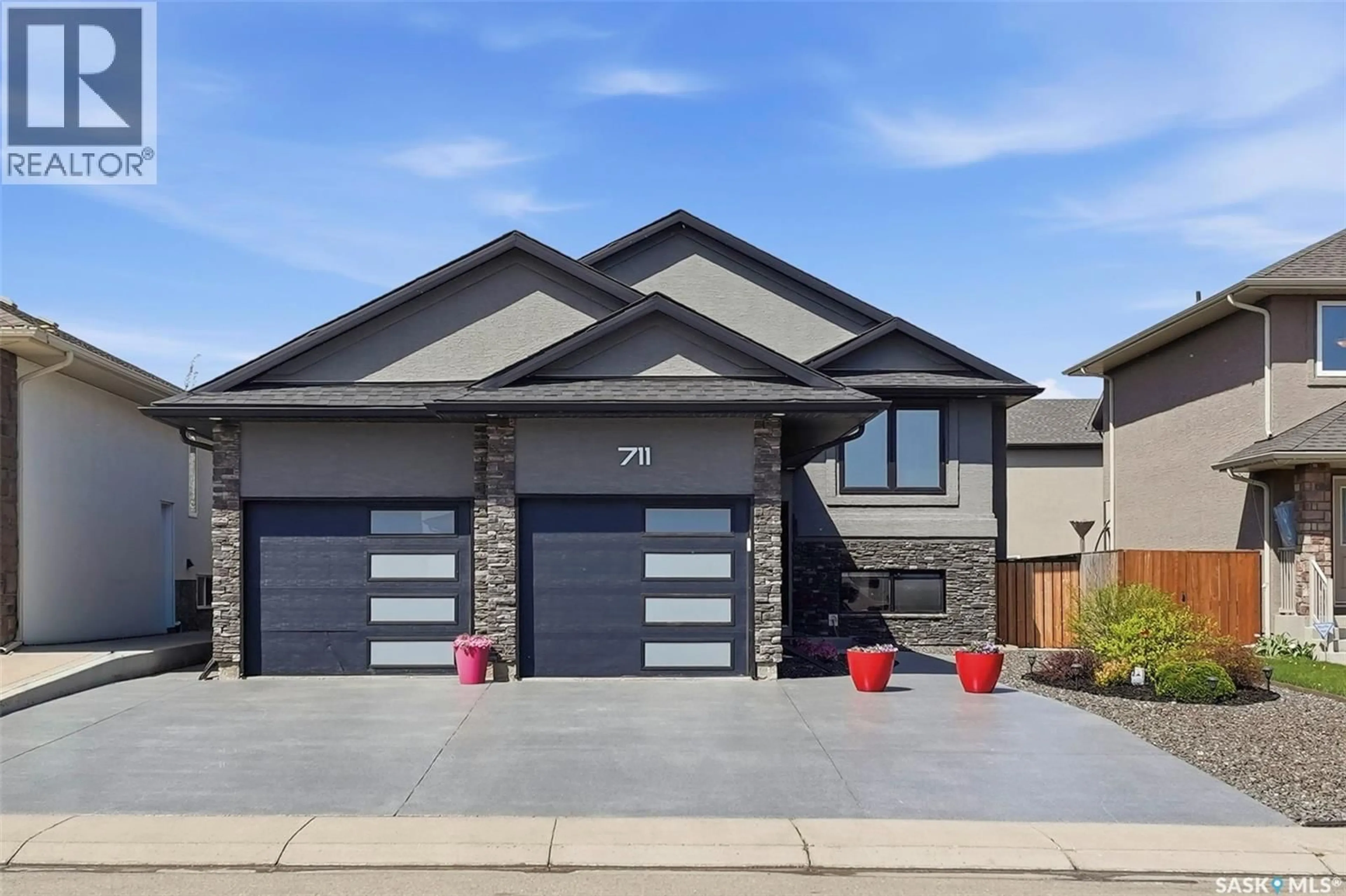 Home with brick exterior material, street for 711 SUTTER CRESCENT, Saskatoon Saskatchewan S7T0R4