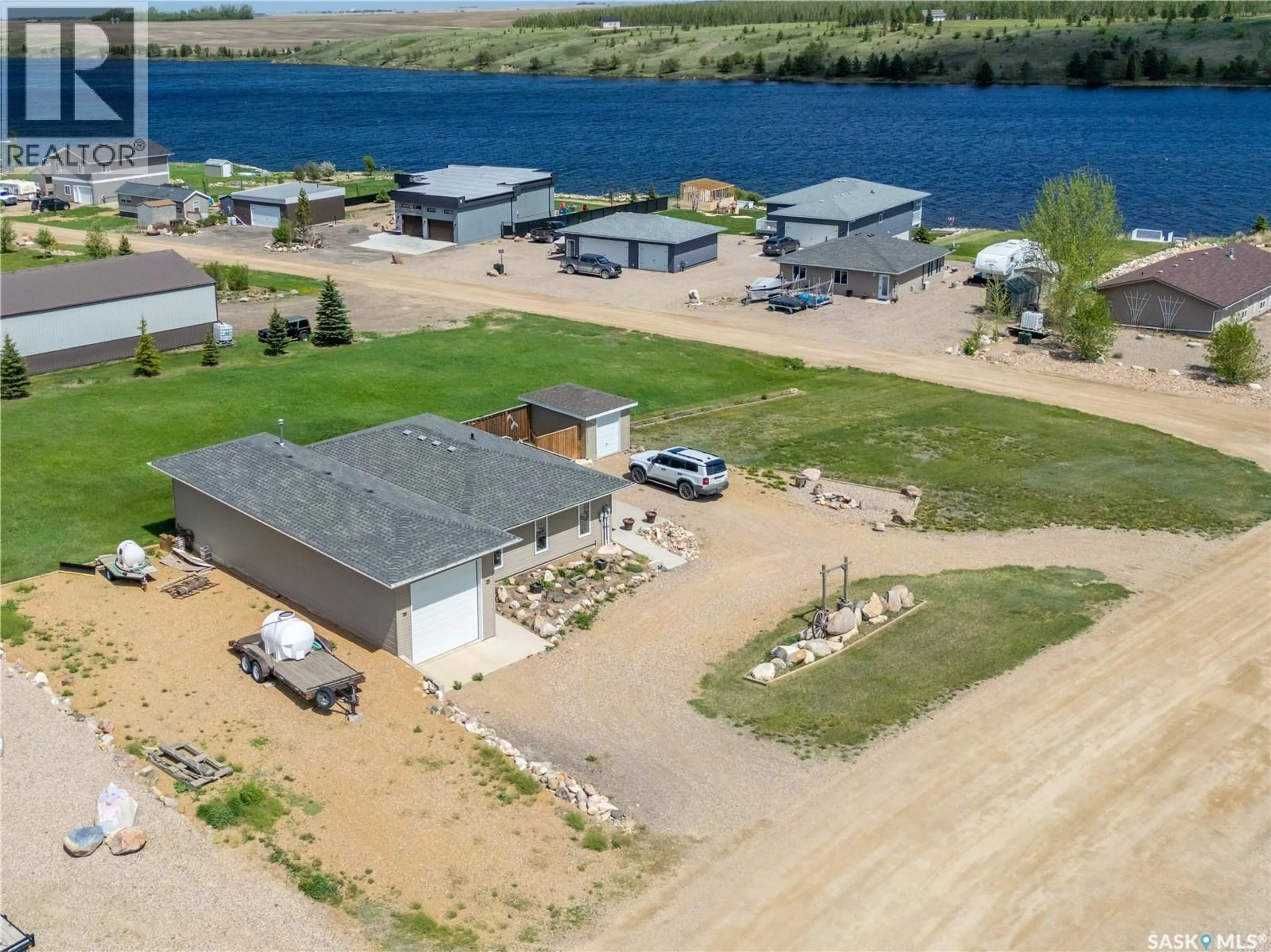 A pic from outside/outdoor area/front of a property/back of a property/a pic from drone, water/lake/river/ocean view for 11 SUNRISE BOULEVARD, Craik Rm No. 222 Saskatchewan S0G0V0